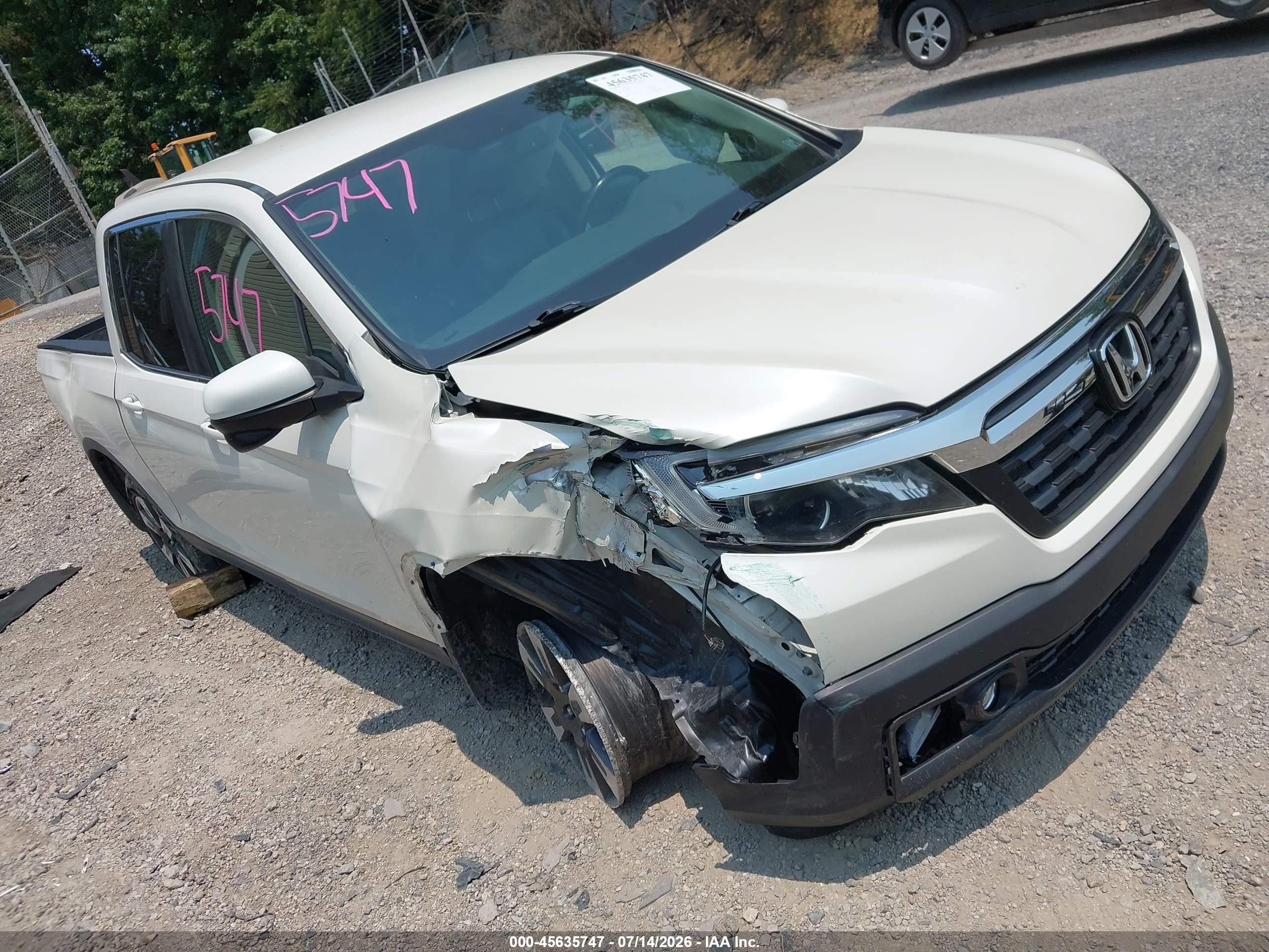2017 Honda Ridgeline RTL-T, VIN 5FPYK3F65HB027709 — Side