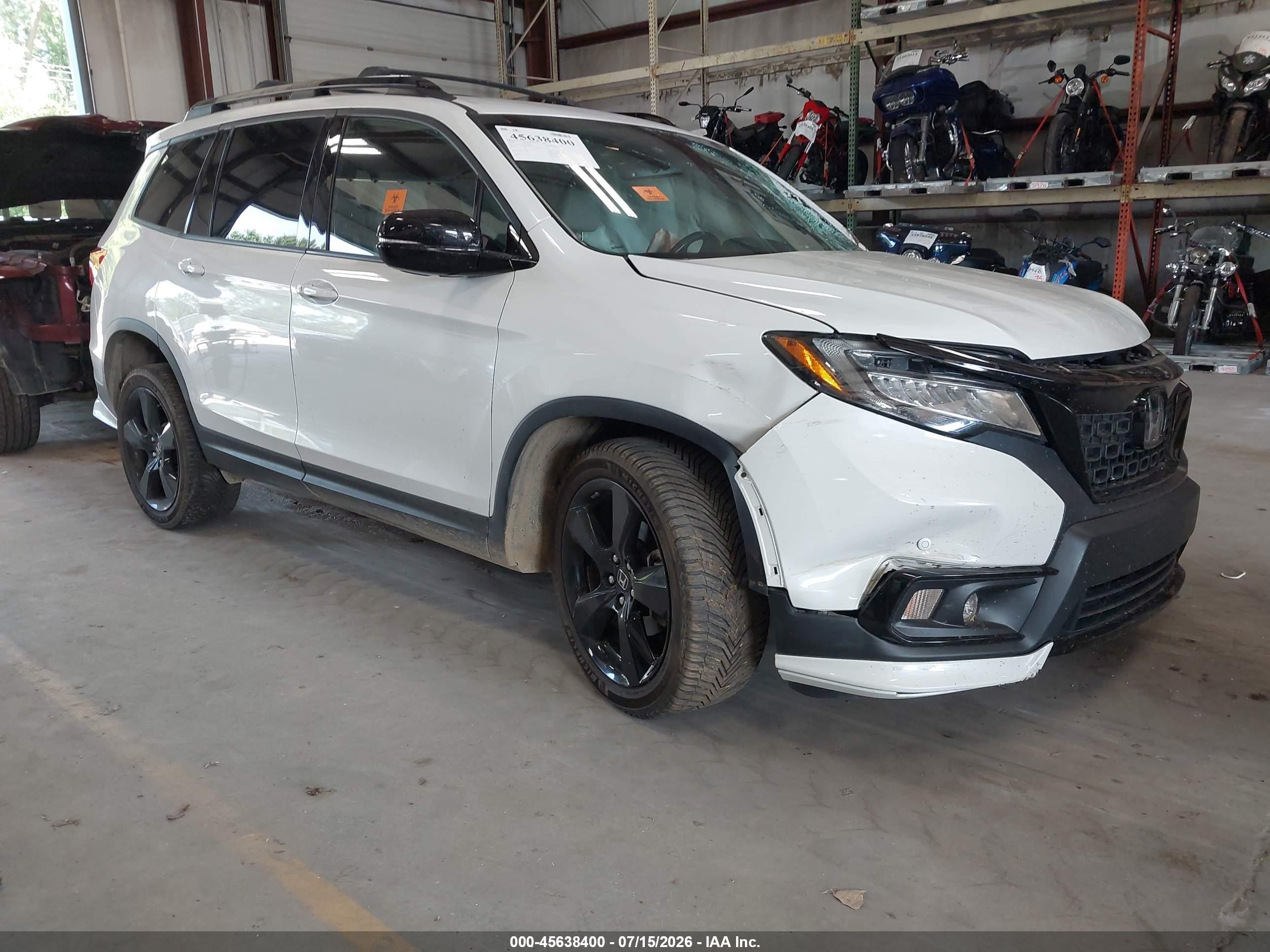 2020 Honda Passport Elite, VIN 5FNYF8H01LB000888 — Side