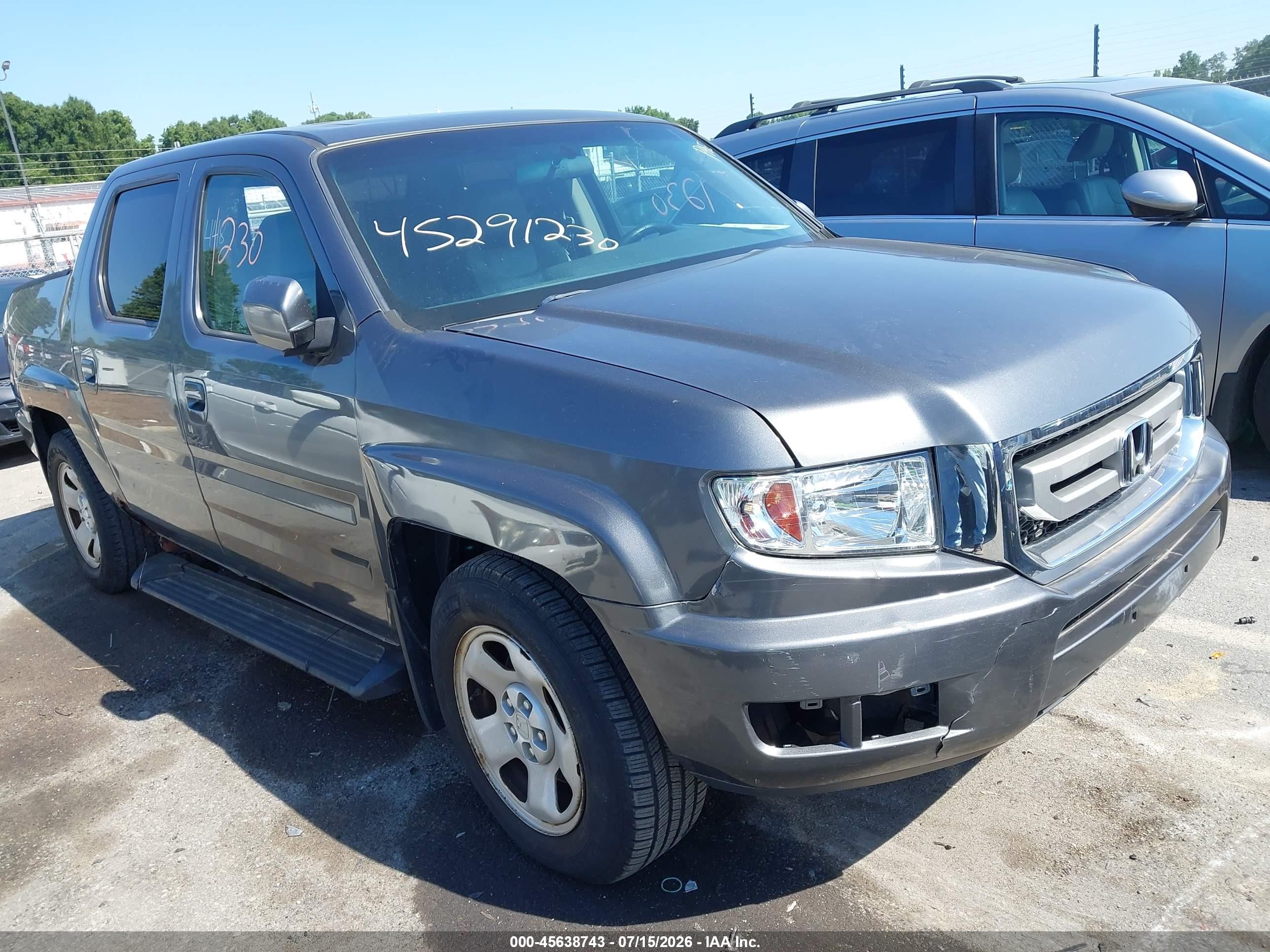 2010 Honda Ridgeline RTL, VIN 5FPYK1F54AB001782 — Side