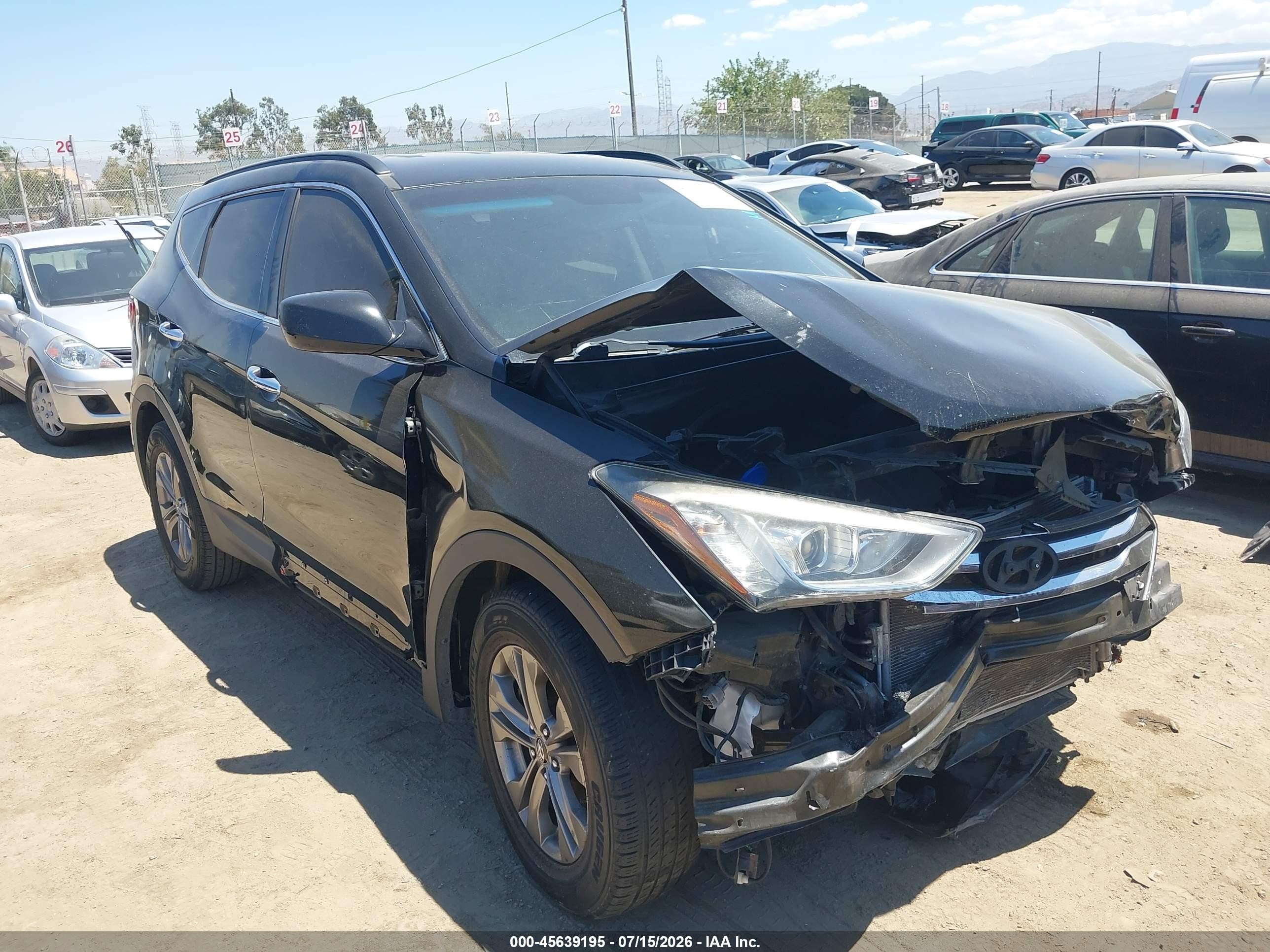 2014 Hyundai Santa Fe, VIN 5XYZU3LB2EG125643 — Front end