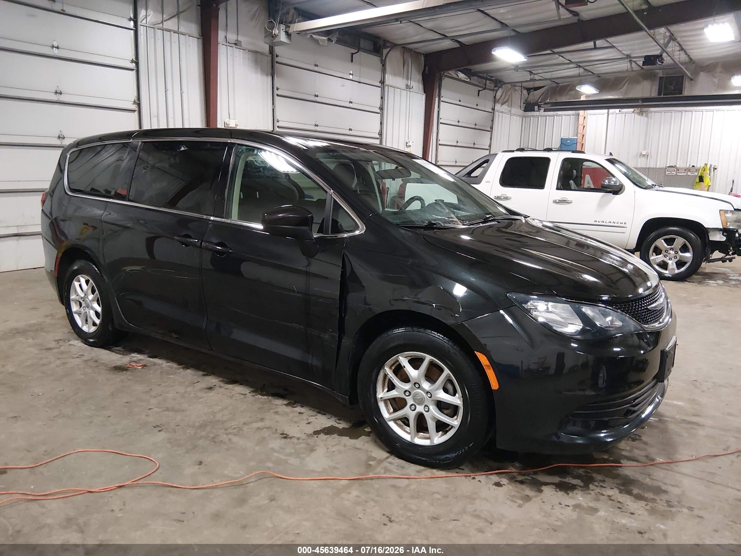 2020 Chrysler Voyager LX, VIN 2C4RC1CGXLR146882 — Side