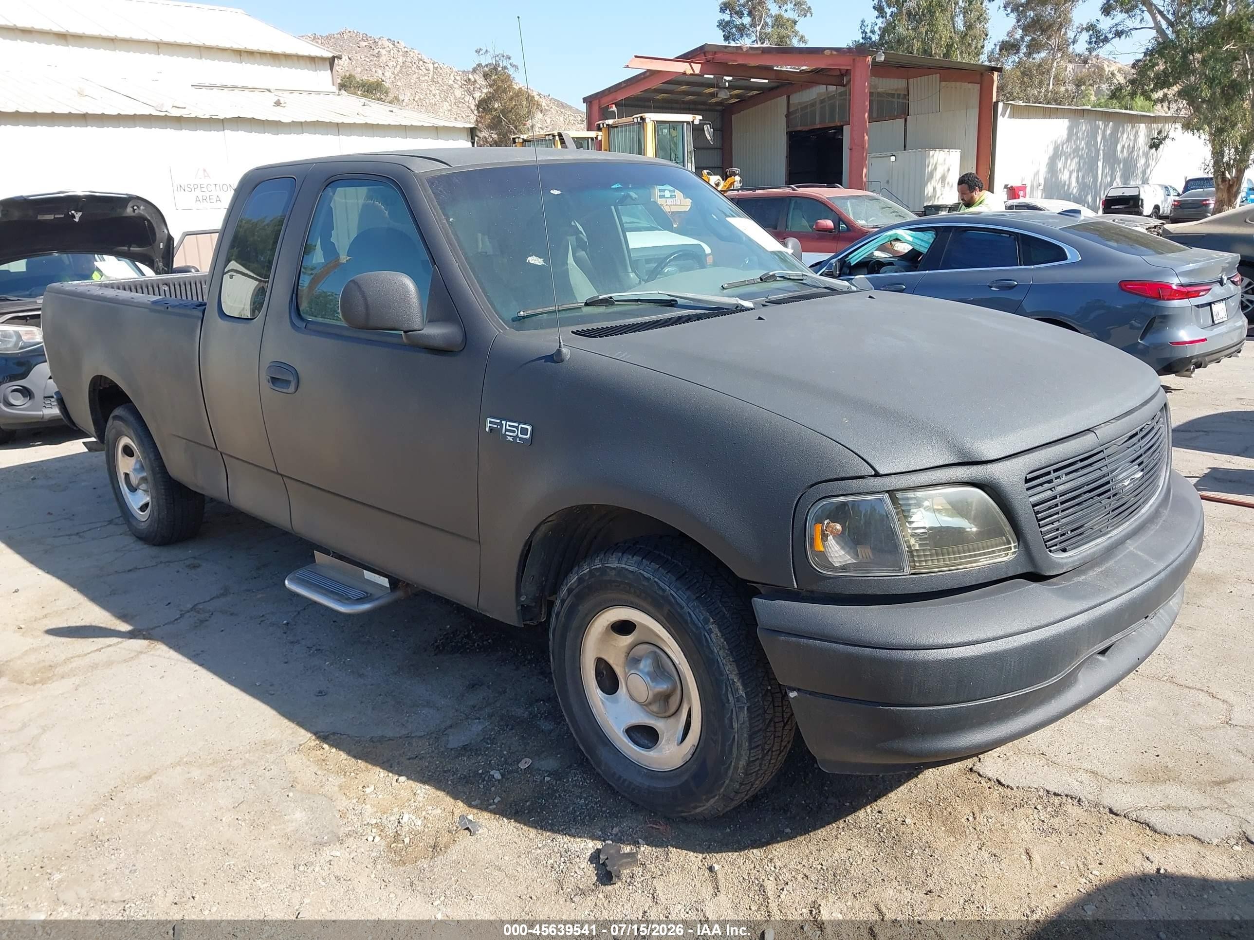 2002 Ford F-150 XL, VIN 1FTRX17262KA56208 — Normal wear