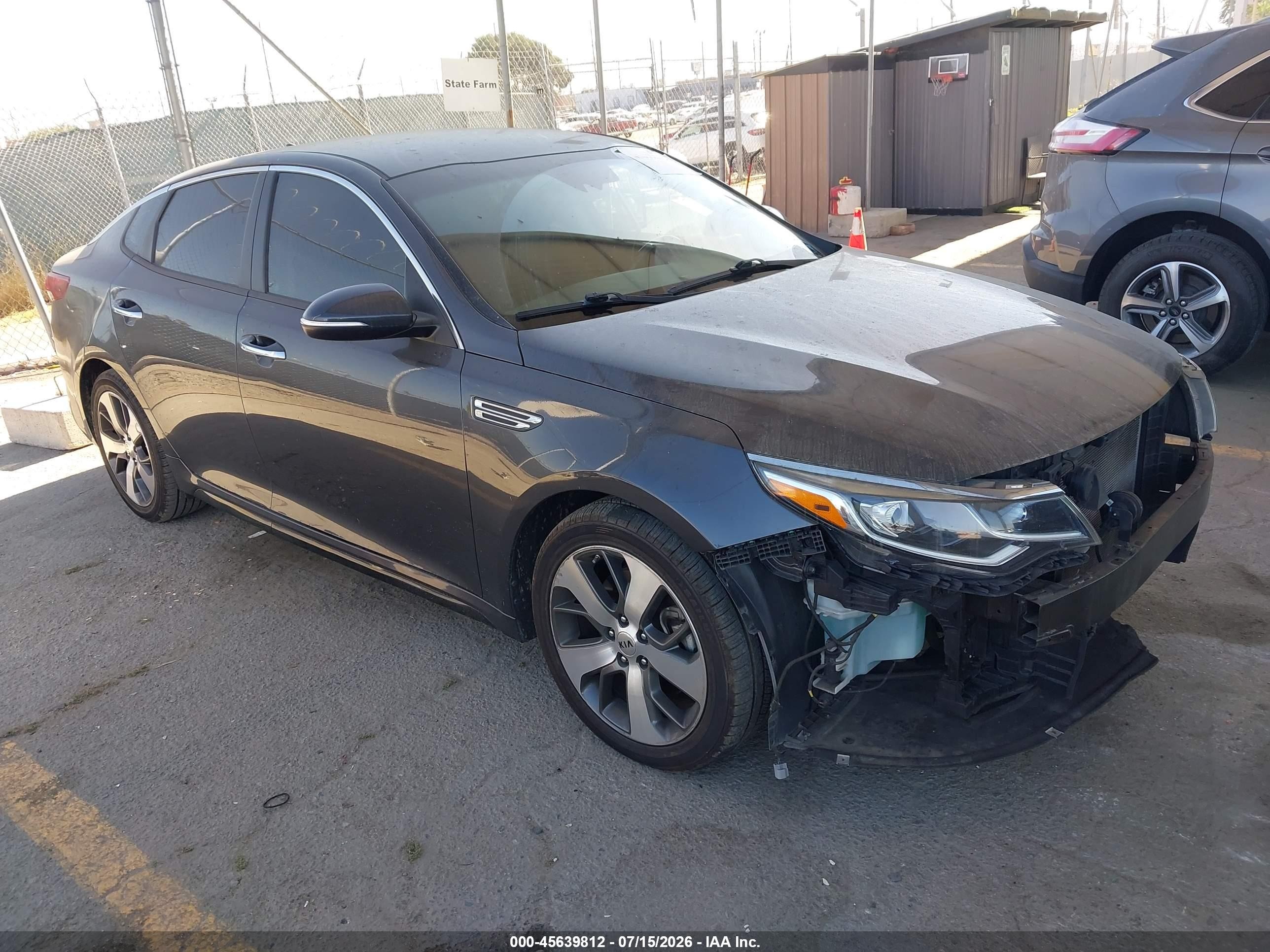 2019 Kia Optima LX, VIN 5XXGT4L33KG317095 — Side