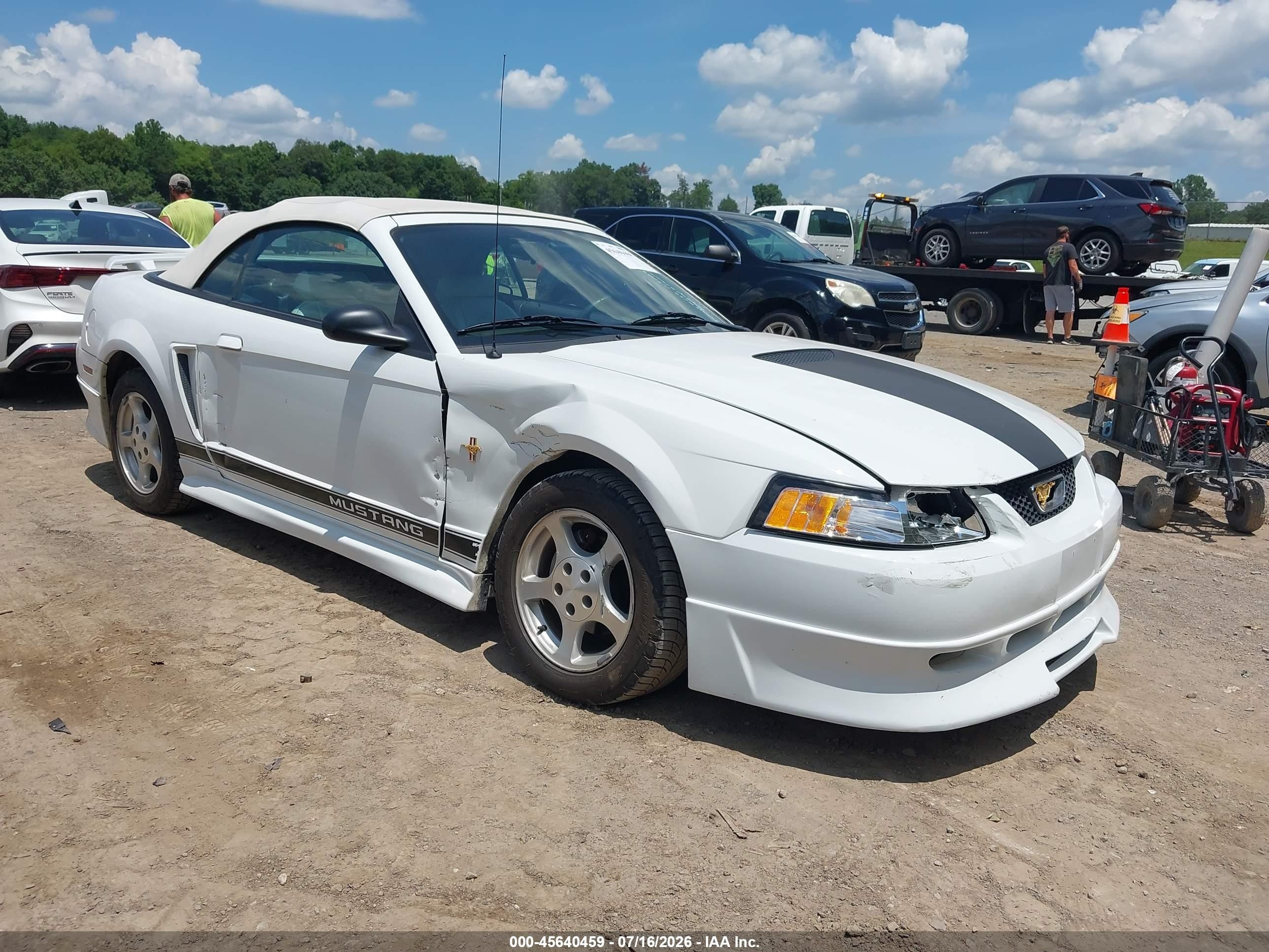 2002 Ford Mustang Deluxe, VIN 1FAFP44432F176346 — Side