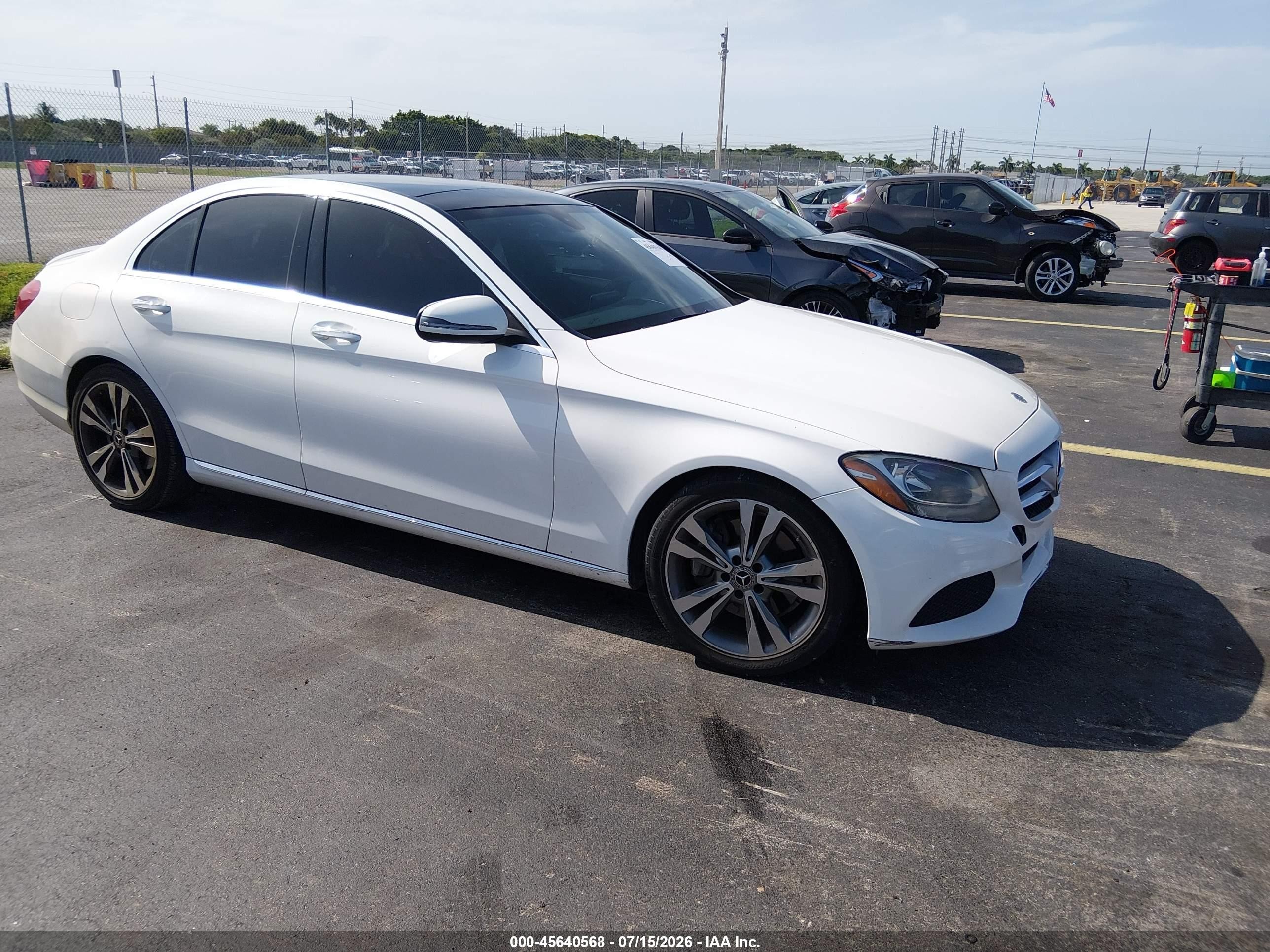 2018 Mercedes-Benz C 300, VIN 55SWF4JB6JU240445 — Side