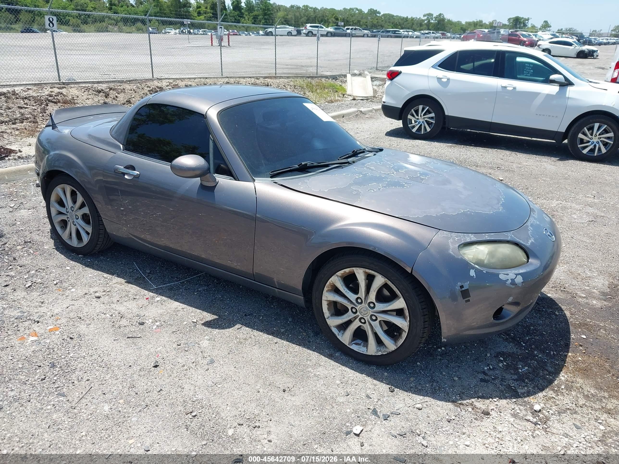 2007 Mazda MX-5 Miata Touring, VIN JM1NC26F670134347 — Side