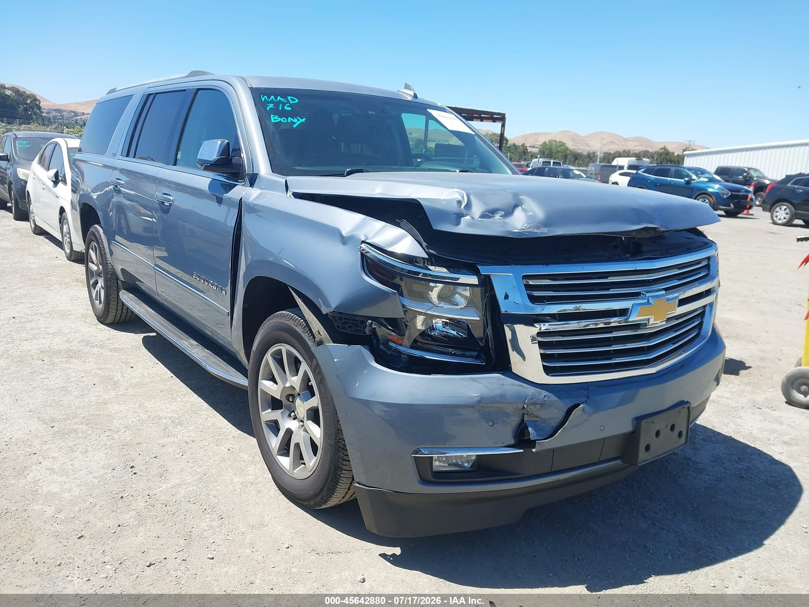 2016 Chevrolet Suburban LTZ, VIN 1GNSKJKC4GR213305 — Front end