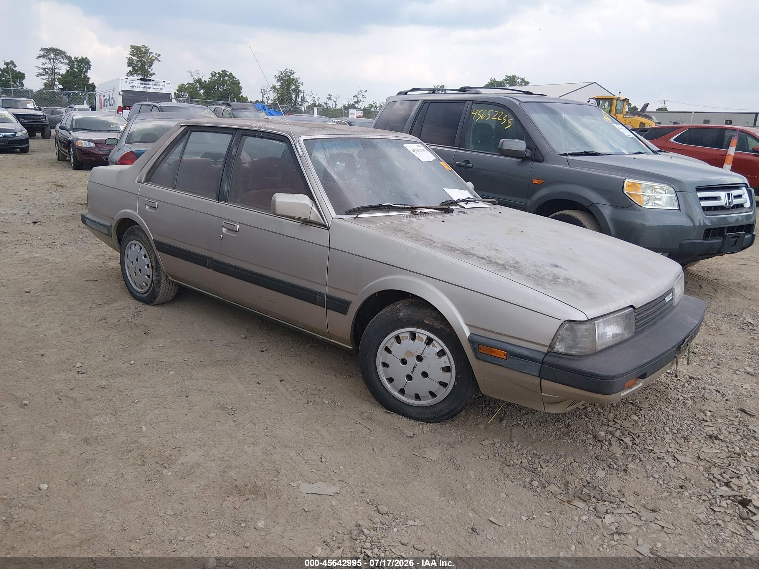 1987 Mazda 626, VIN JM1GC2218H1112834 — Normal wear