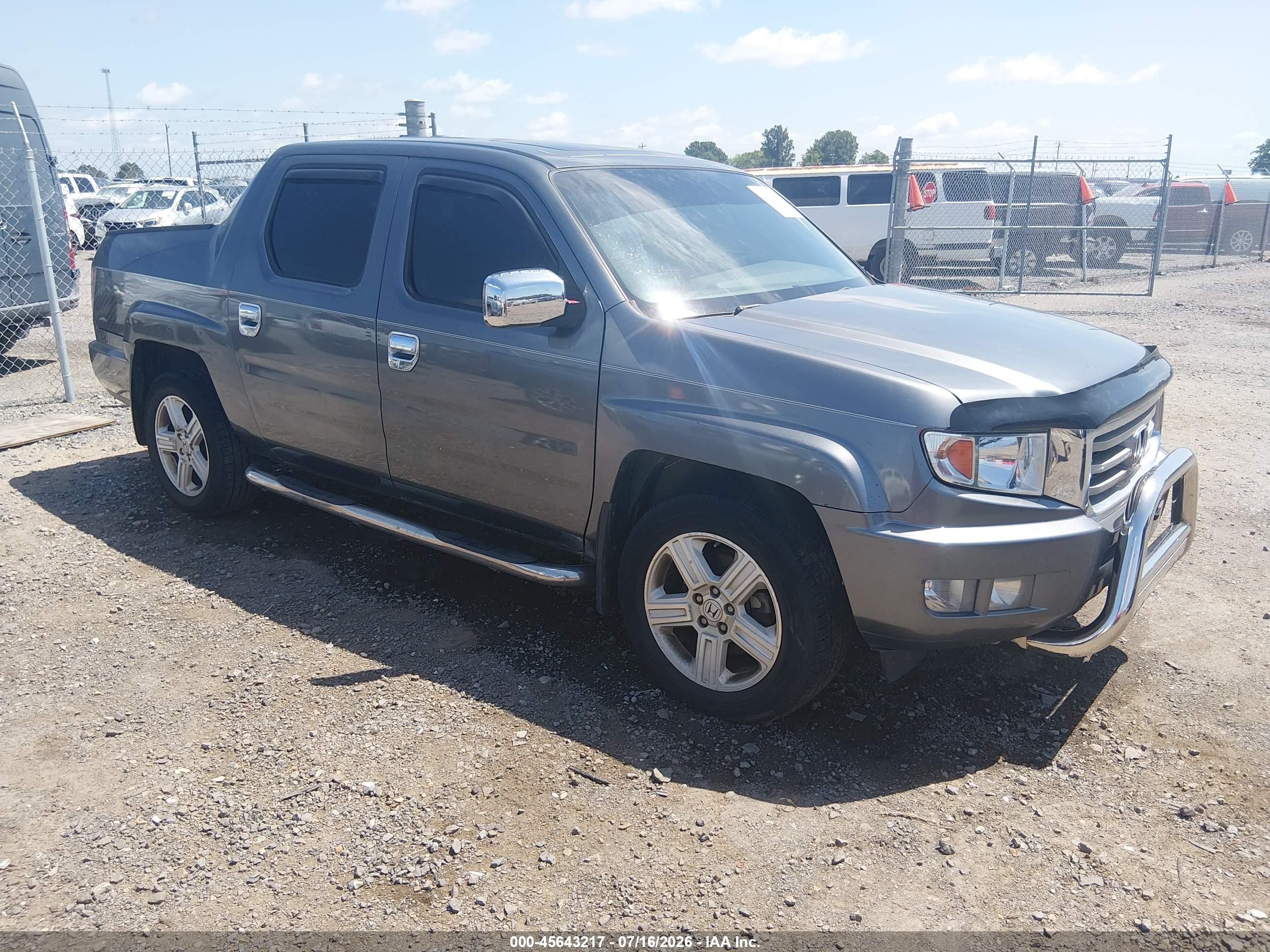 2012 Honda Ridgeline RTL, VIN 5FPYK1F51CB457970 — Side