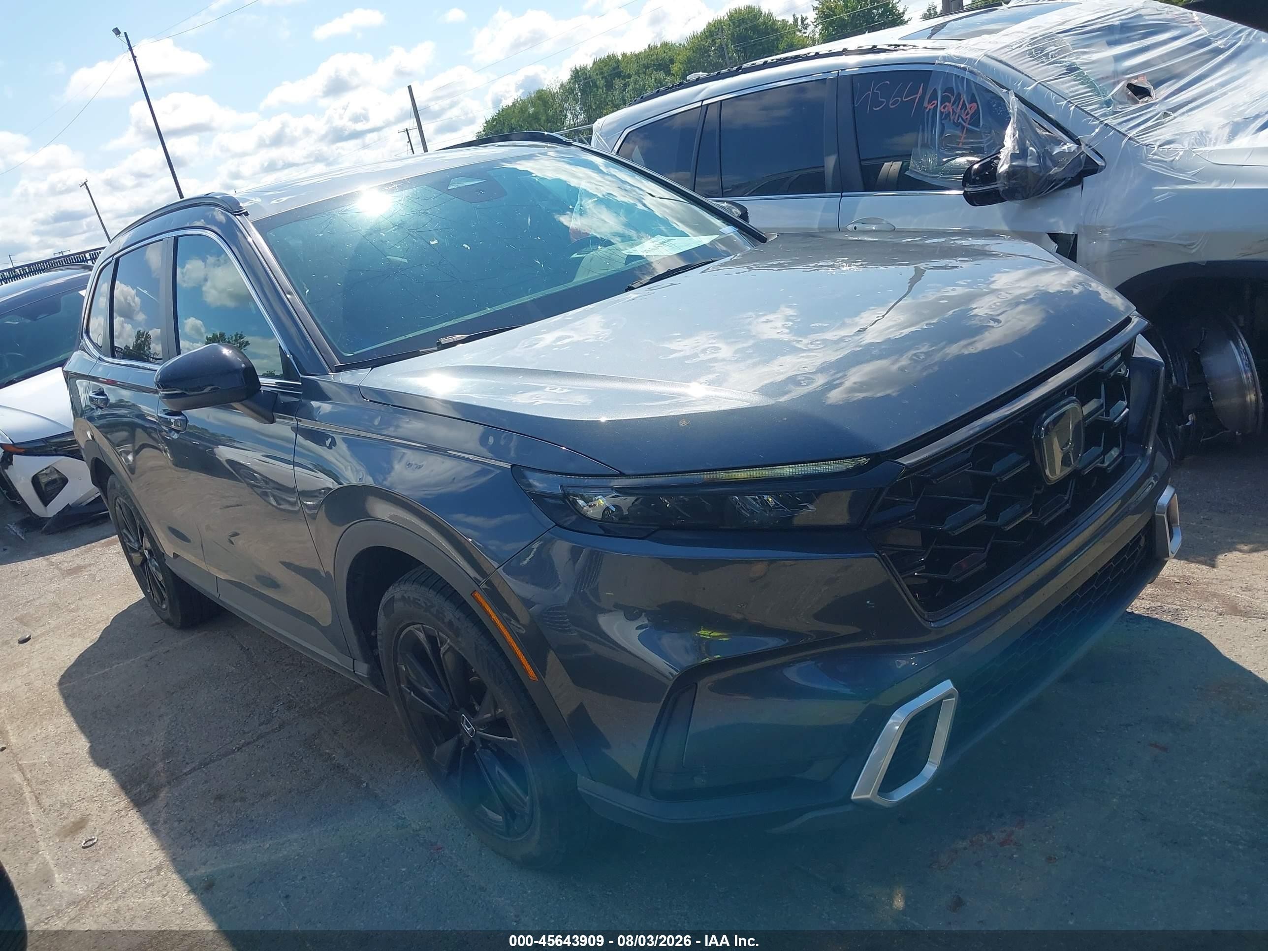 2023 Honda CR-V Sport Touring, VIN 7FARS6H99PE002238 — Hail