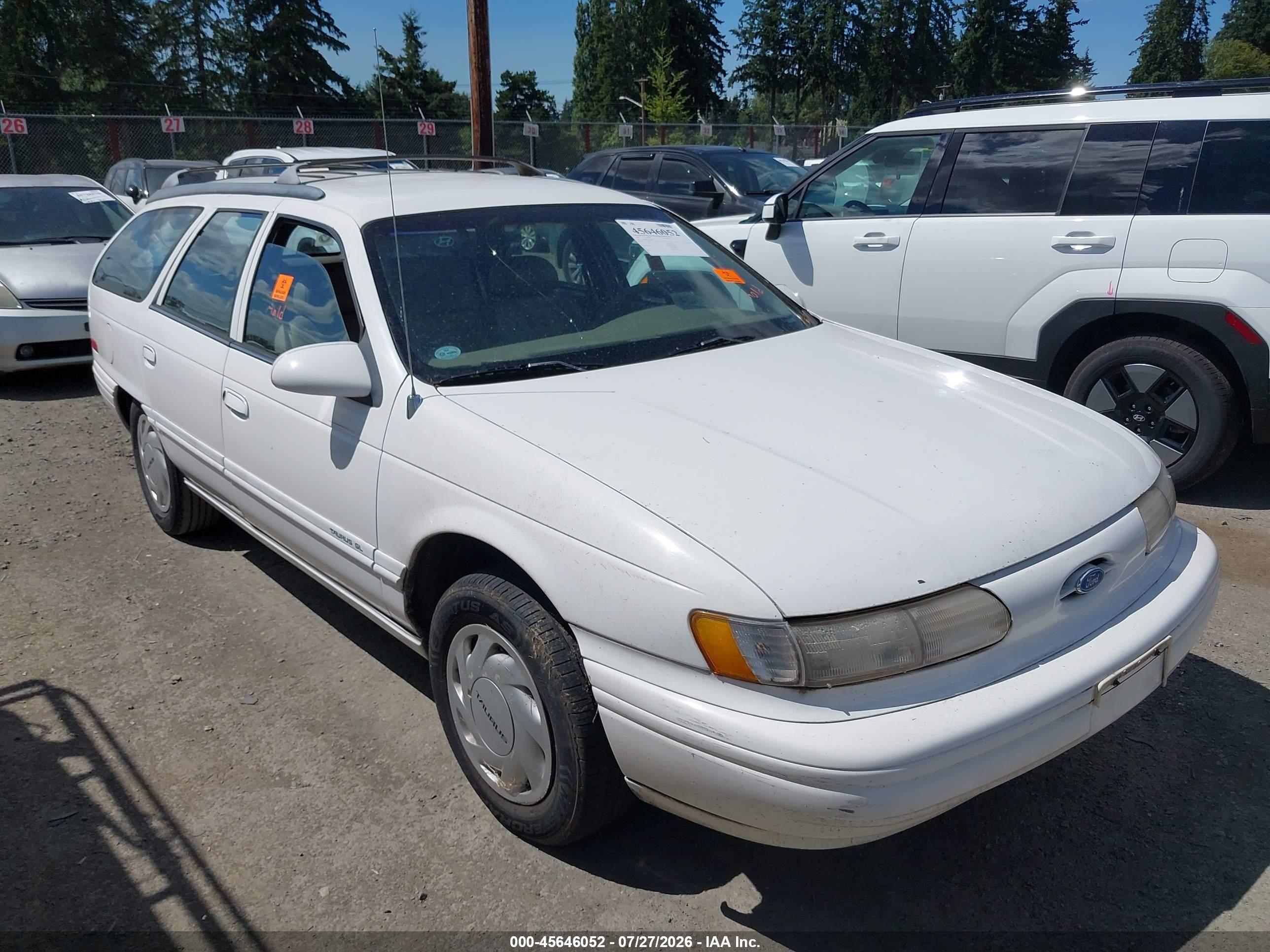 1995 Ford Taurus GL, VIN 1FALP57U3SG129820 — Normal wear