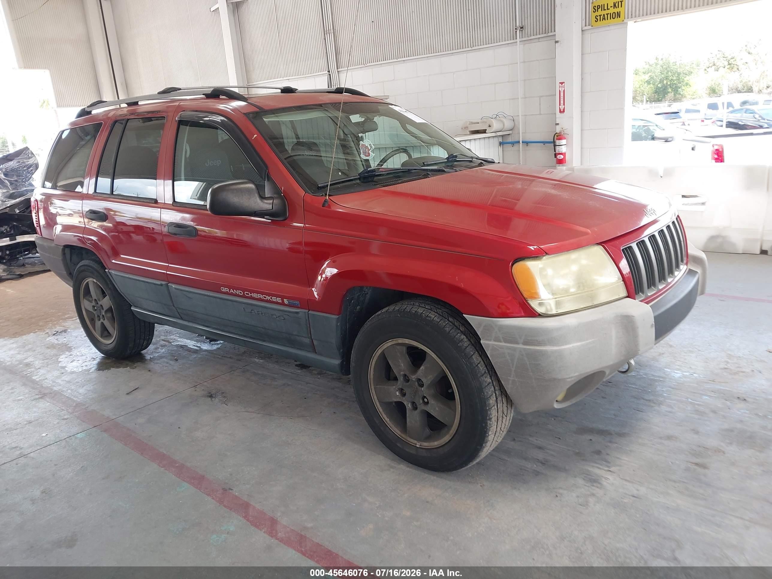 2004 Jeep Grand Cherokee Laredo, VIN 1J8GX48SX4C249667 — Бок