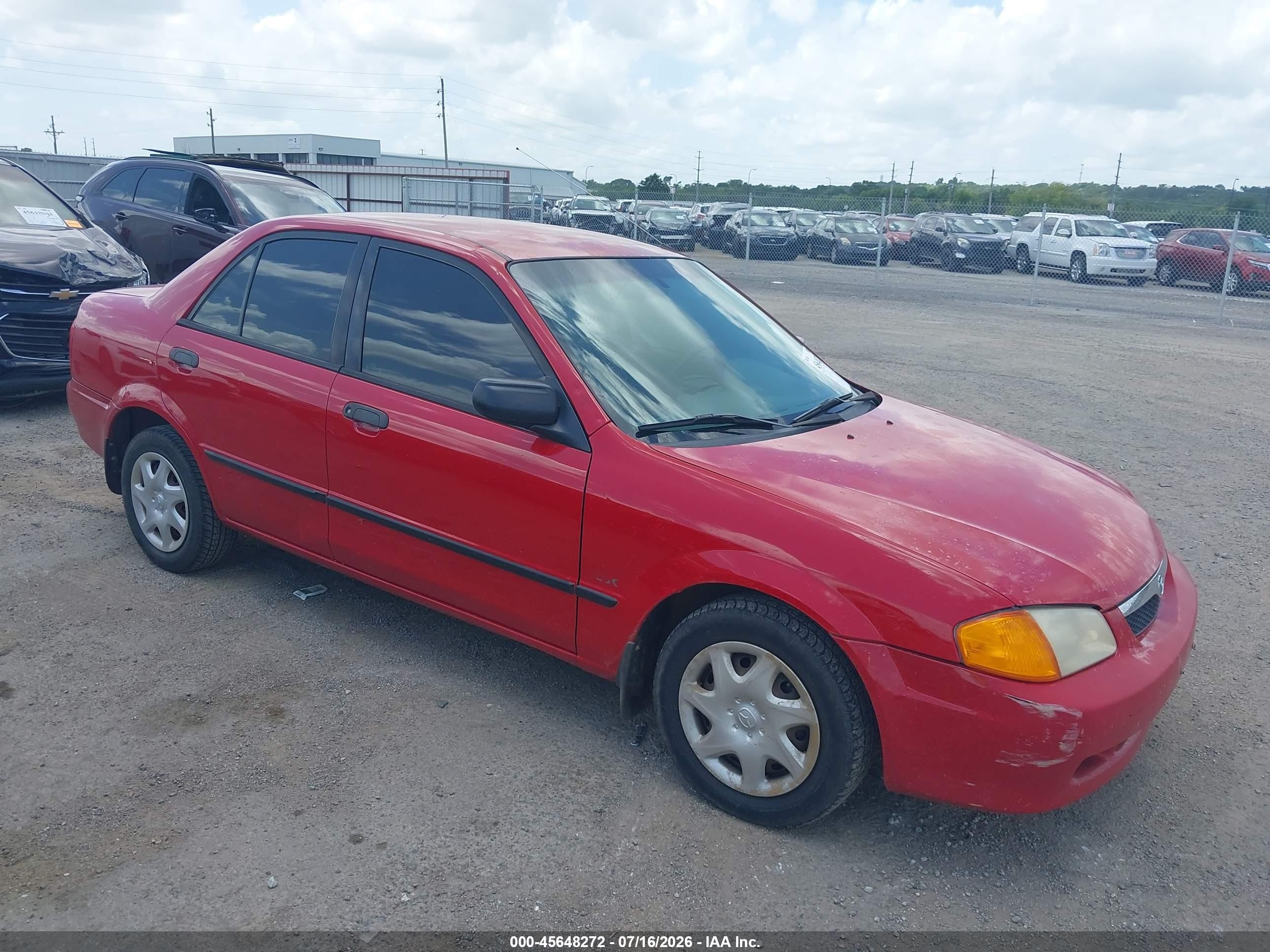 2000 Mazda Protege DX, VIN JM1BJ2225Y0246487 — Normal wear