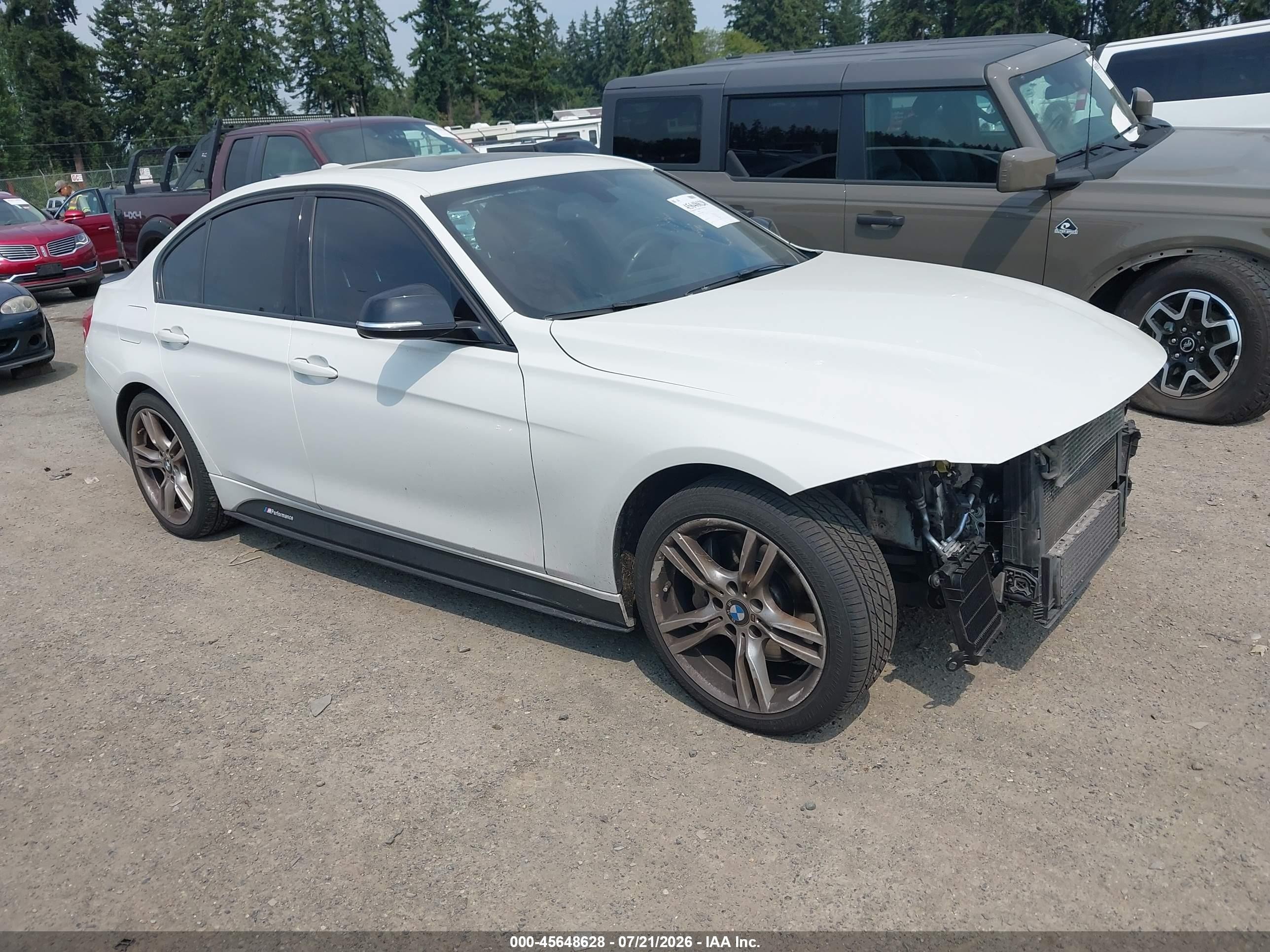 2013 BMW 3 Series 335i xDrive, VIN WBA3B9G52DNR90085 — Front end