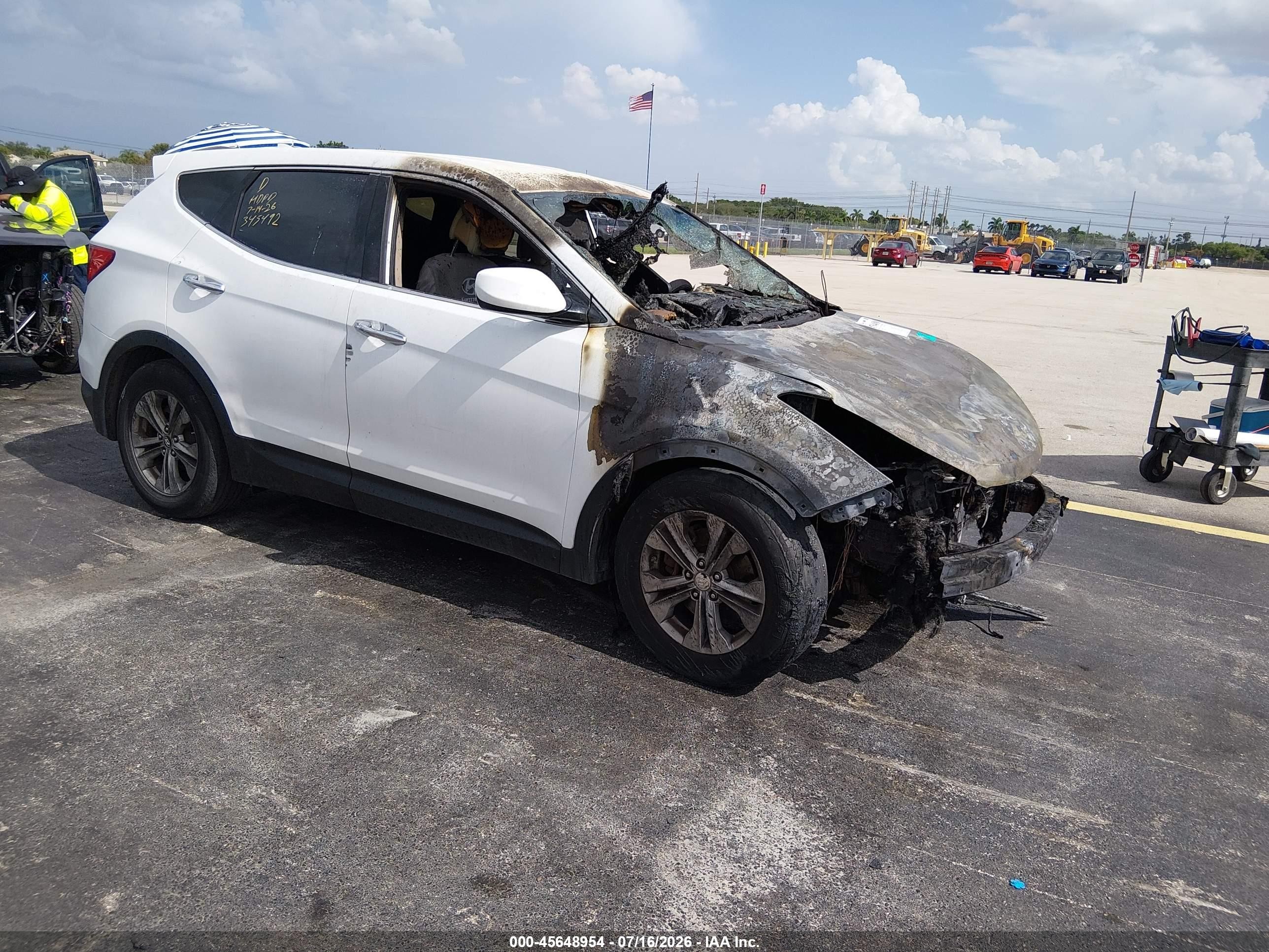 2014 Hyundai Santa Fe, VIN 5XYZT3LB6EG161435 — Engine fire