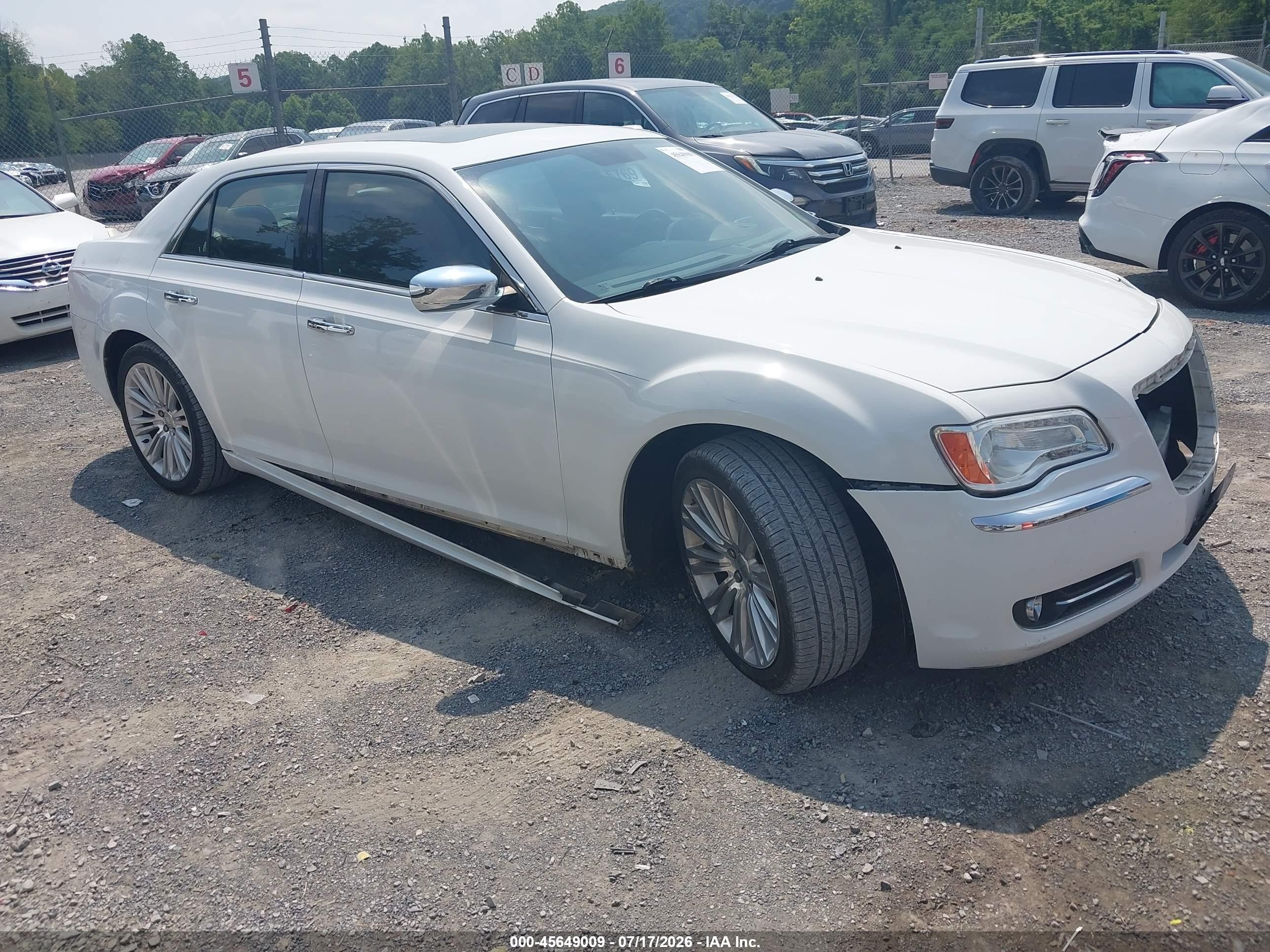 2011 Chrysler 300 Limited, VIN 2C3CA5CG1BH564193 — Side