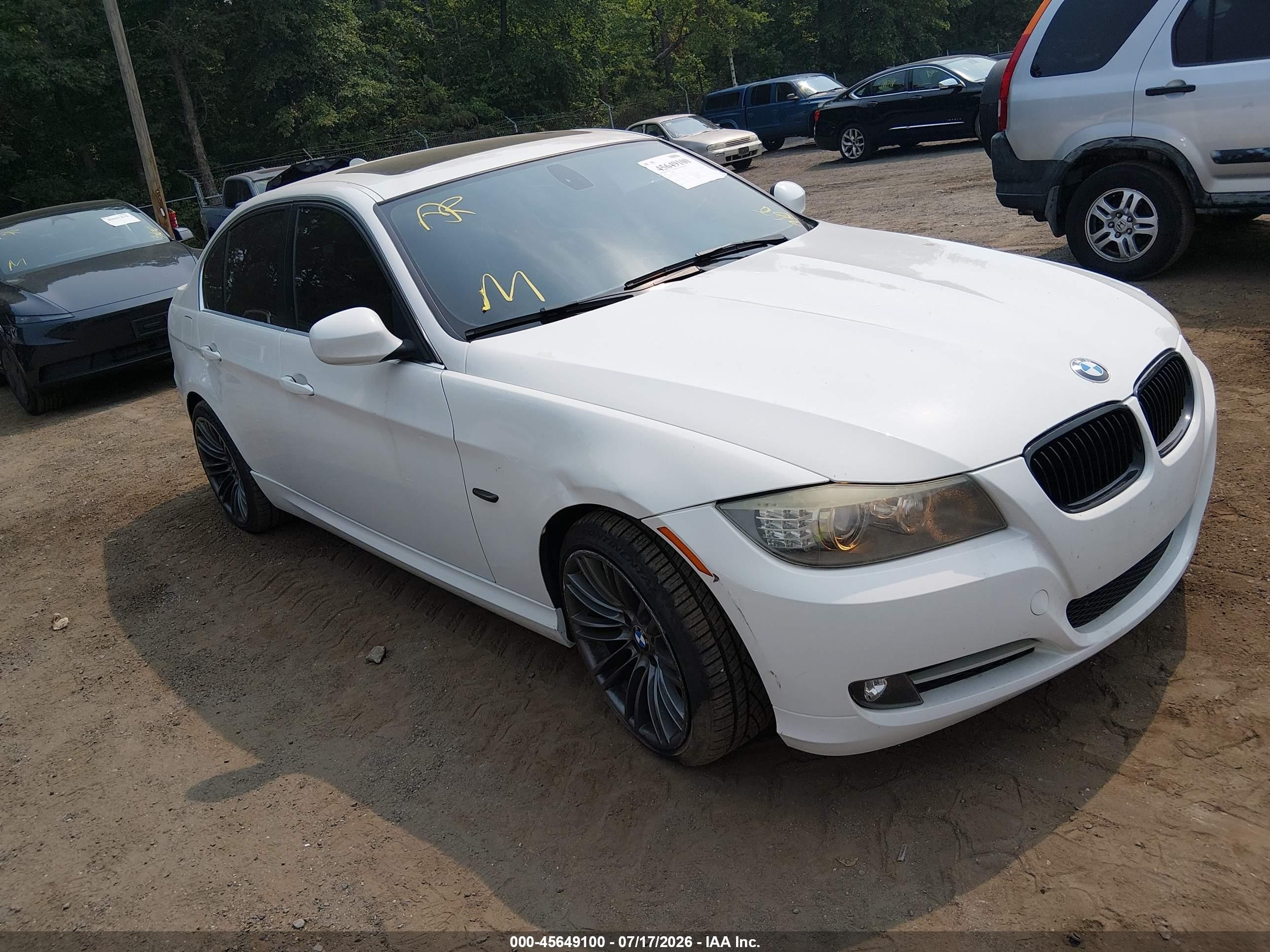2011 BMW 3 Series 335i, VIN WBAPM5C53BE576577 — Side