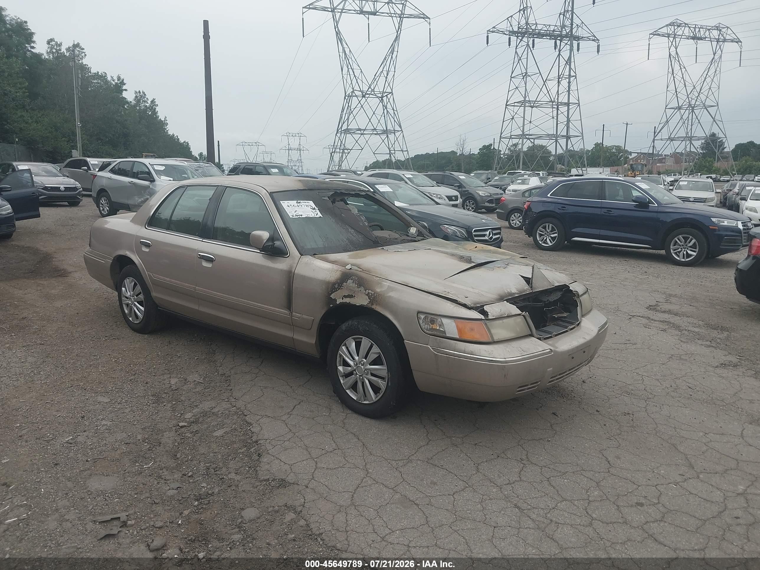 1998 Mercury Grand Marquis GS, VIN 2MEFM74W7WX692661 — Engine fire
