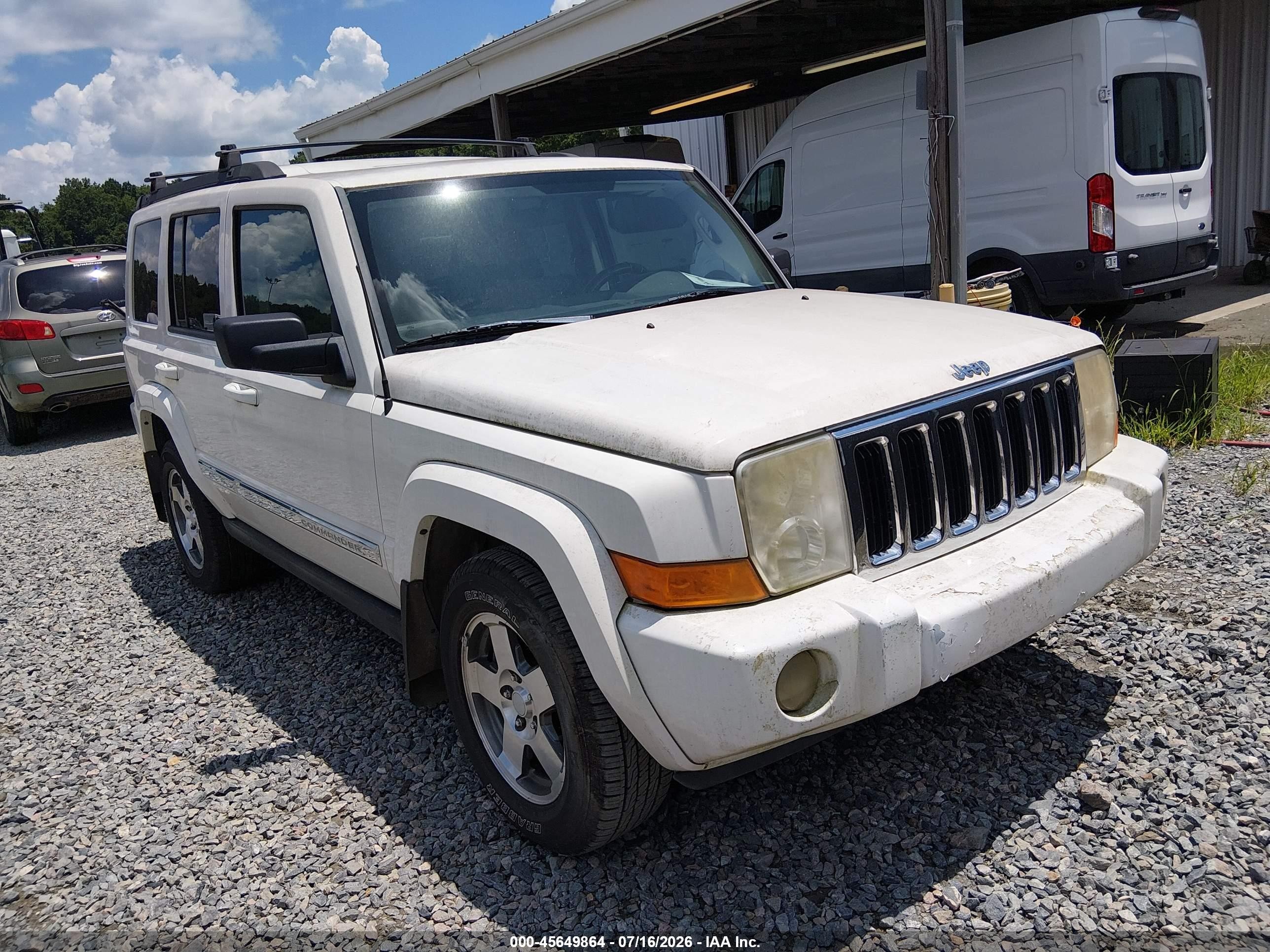 2010 Jeep Commander Sport, VIN 1J4RH4GK3AC157658 — Normal wear