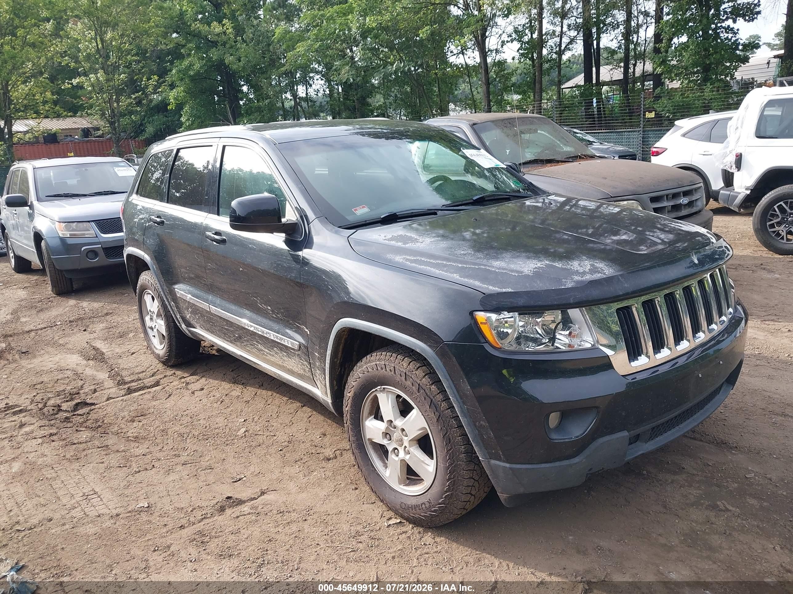 2013 Jeep Grand Cherokee Laredo, VIN 1C4RJEAG9DC516942 — Rear end
