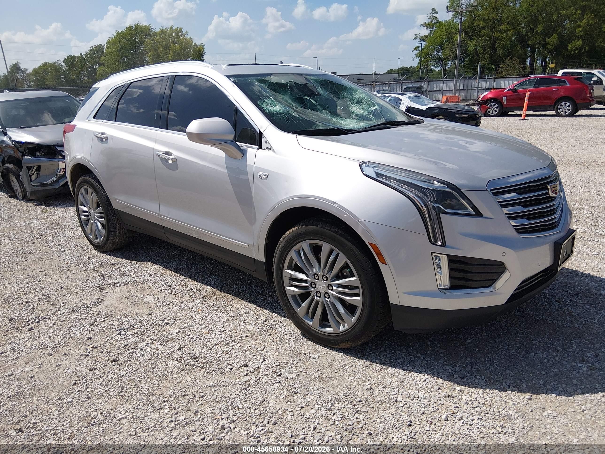 2018 Cadillac XT5 Premium Luxury FWD, VIN 1GYKNERS5JZ139267 — Hail
