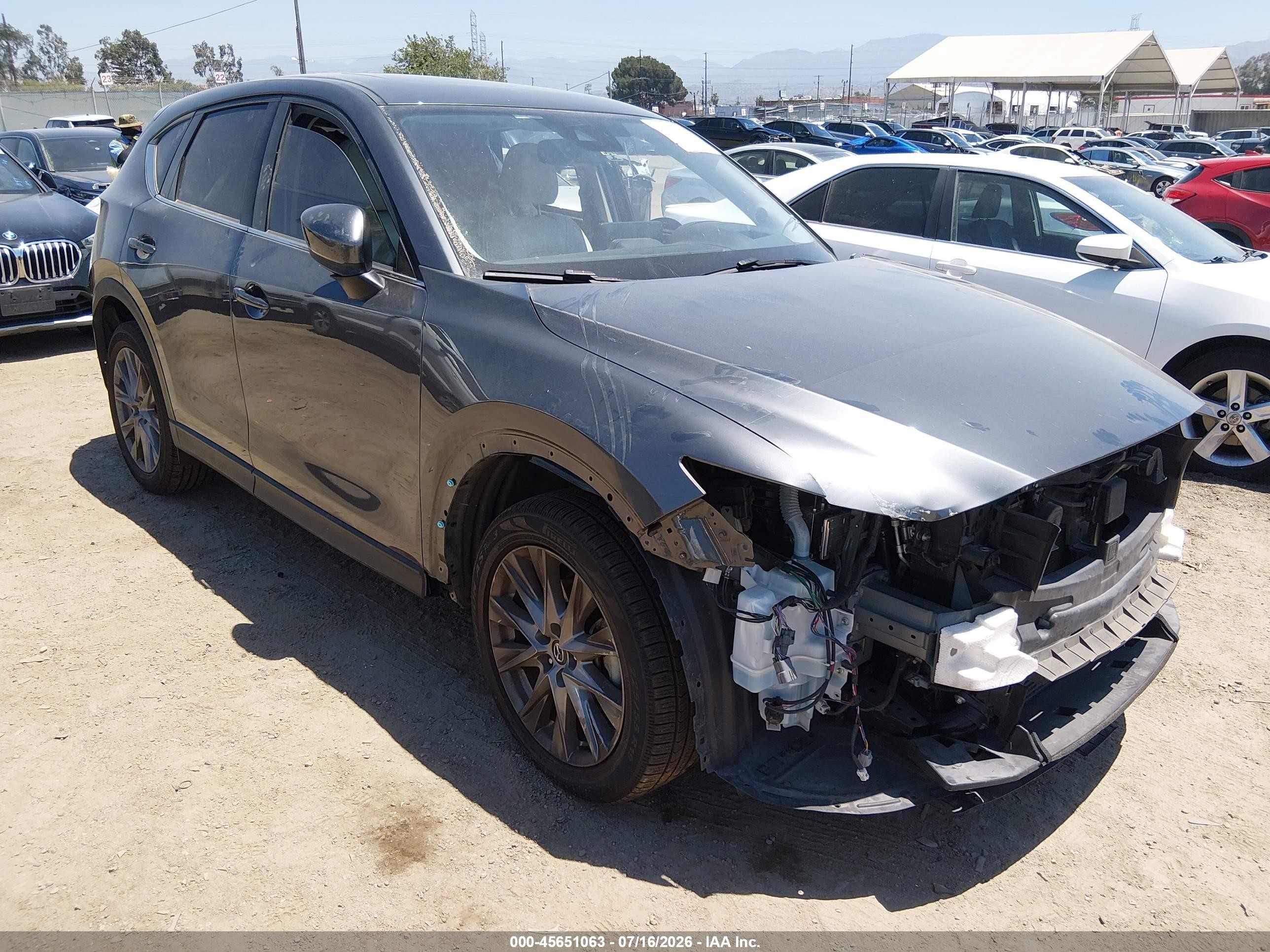 2021 Mazda CX-5 Grand Touring Reserve, VIN JM3KFBAYXM0377262 — Side