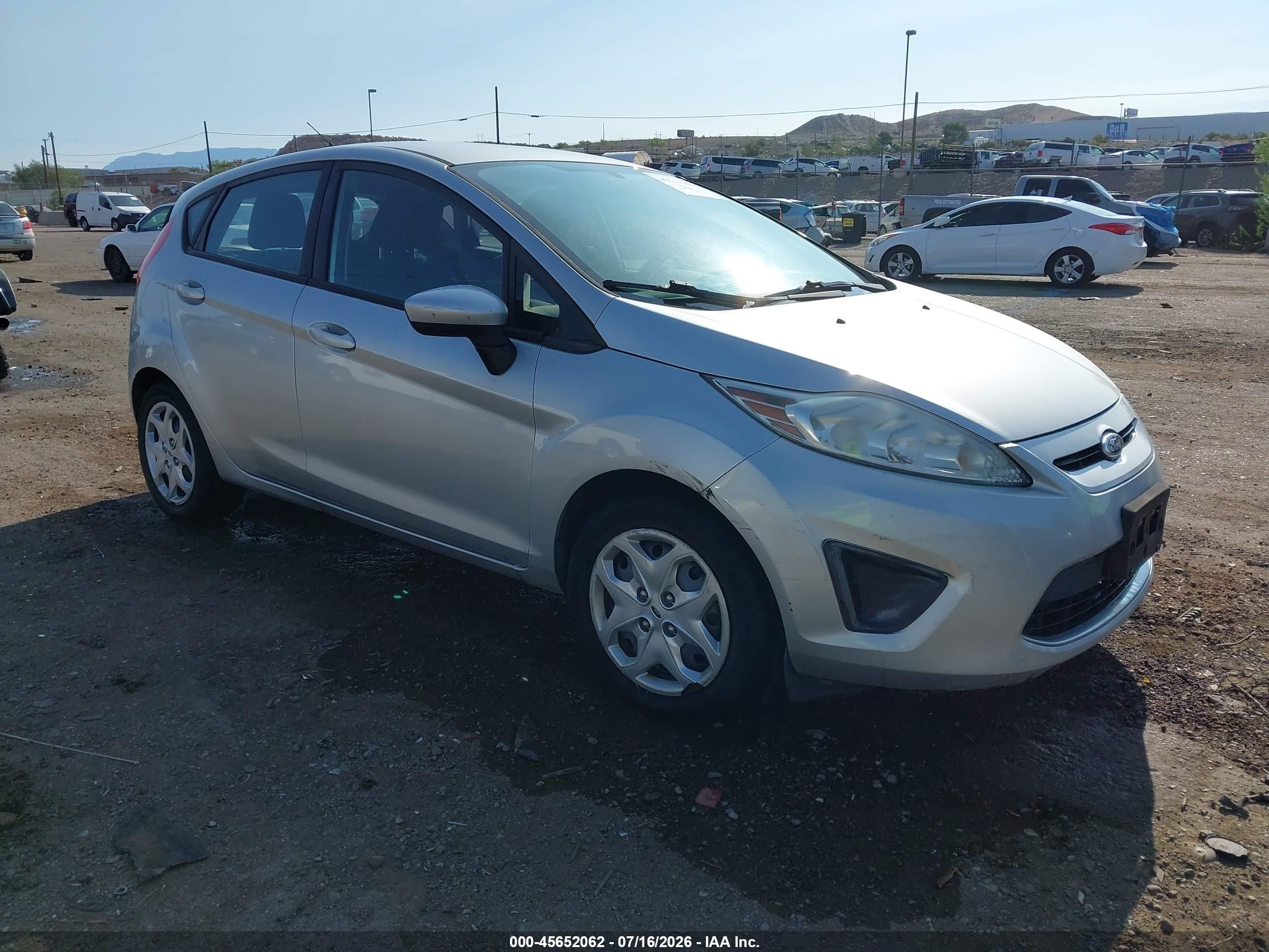 2011 Ford Fiesta SE, VIN 3FADP4EJ1BM234188 — Normal wear