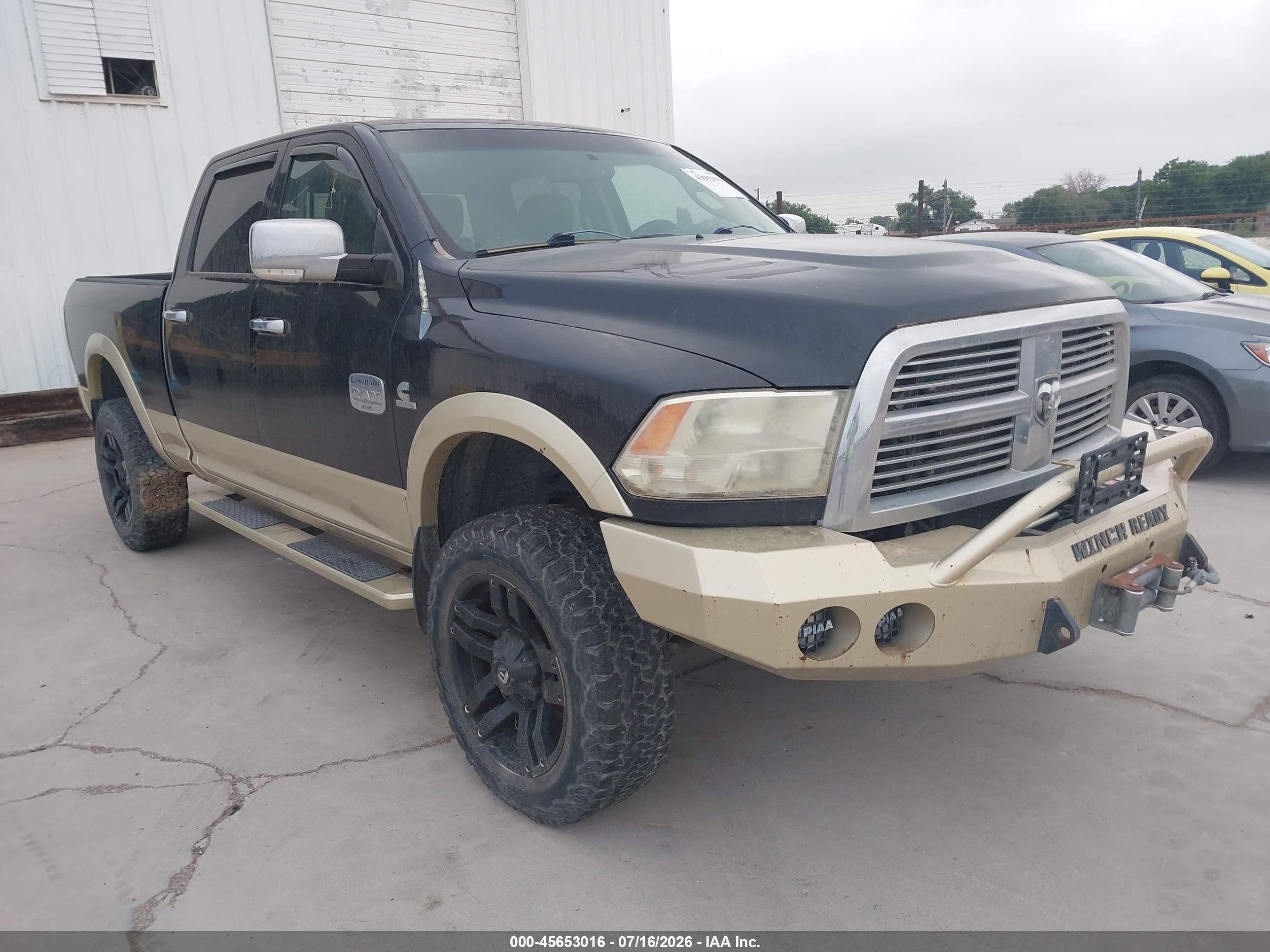 2011 Ram 2500 Laramie, VIN 3D7UT2CL8BG571086 — Side