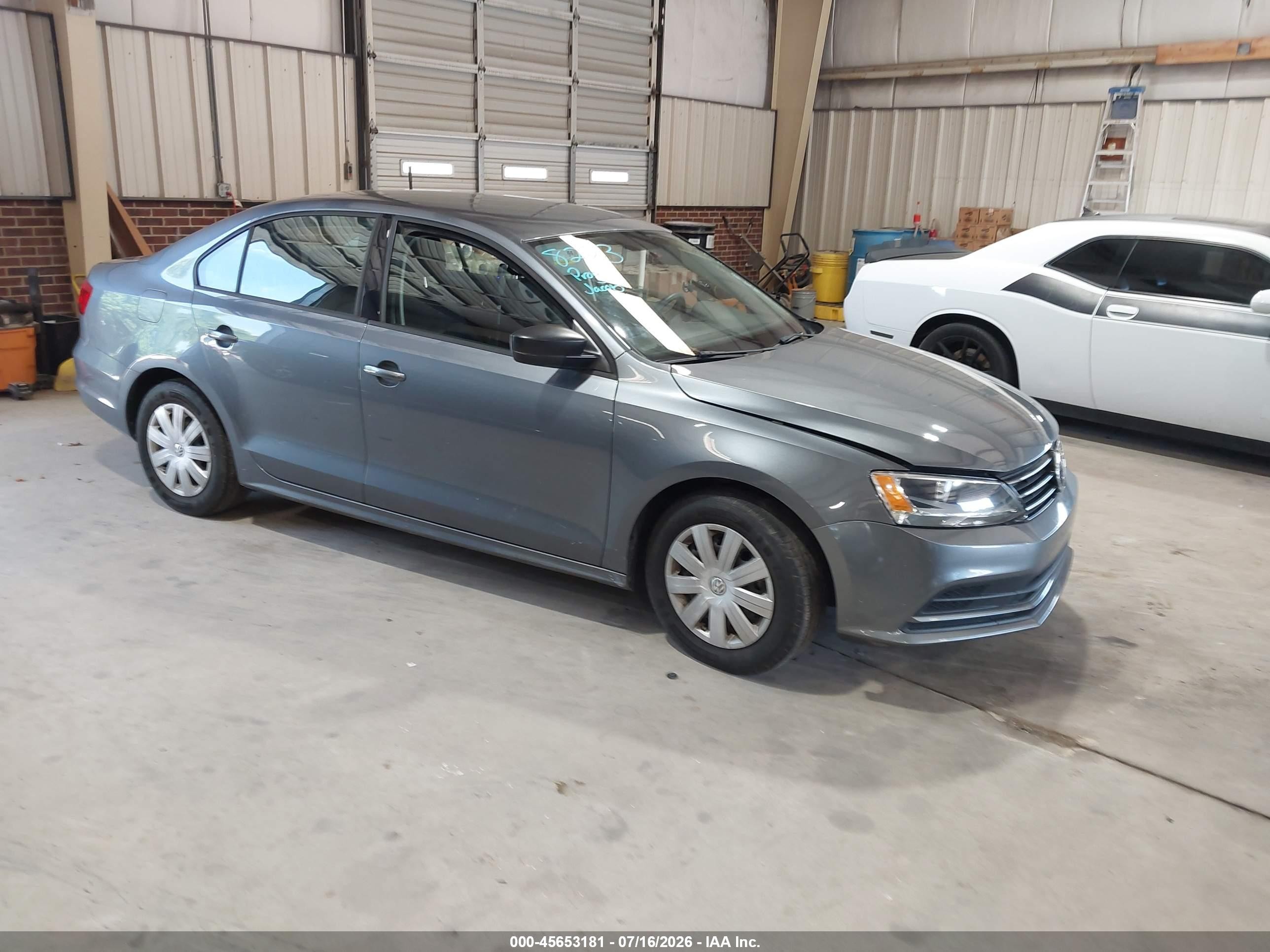 2015 Volkswagen Jetta S, VIN 3VW2K7AJ1FM402146 — Side