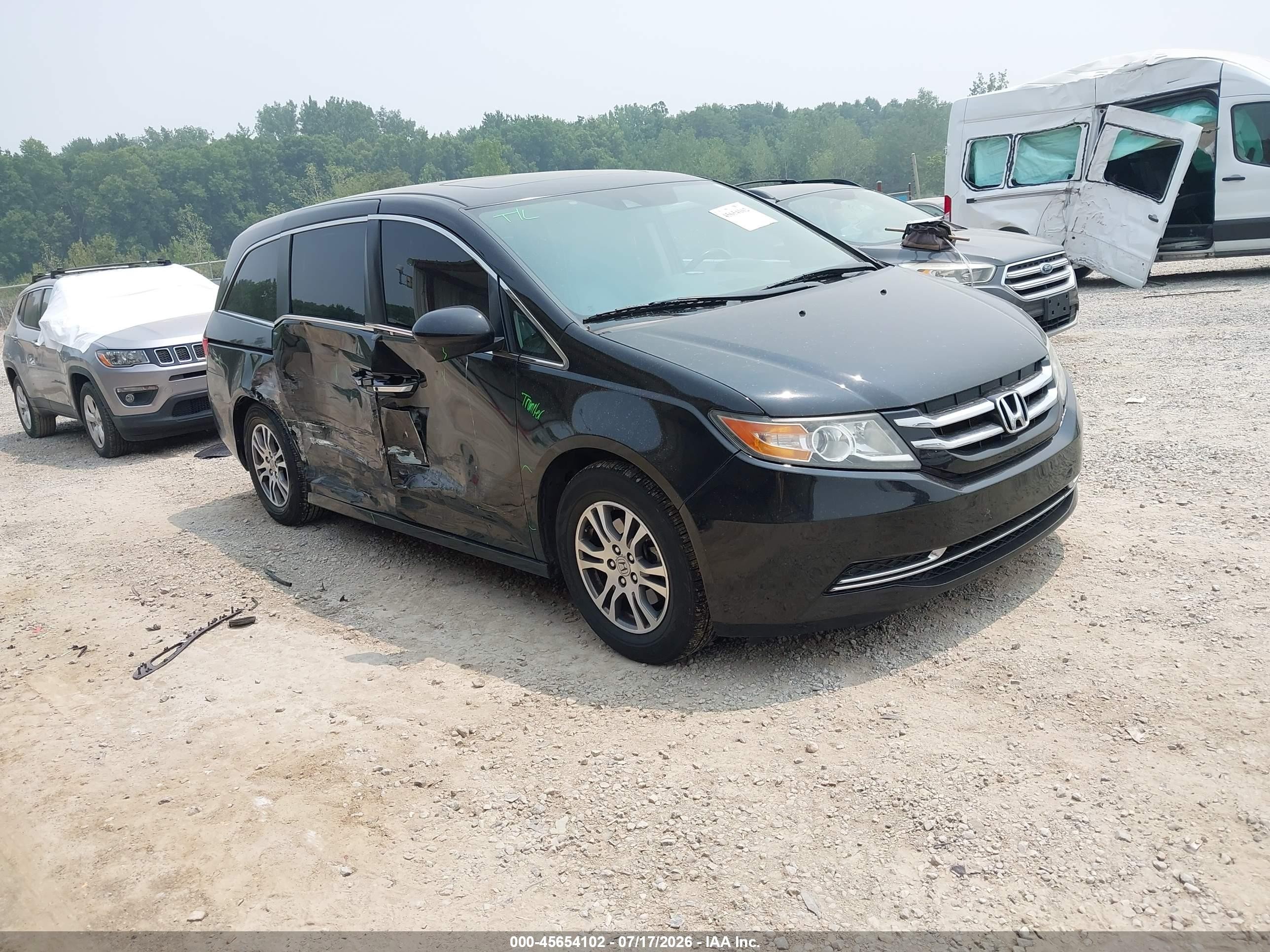 2017 Honda Odyssey EX-L, VIN 5FNRL5H61HB006911 — Side