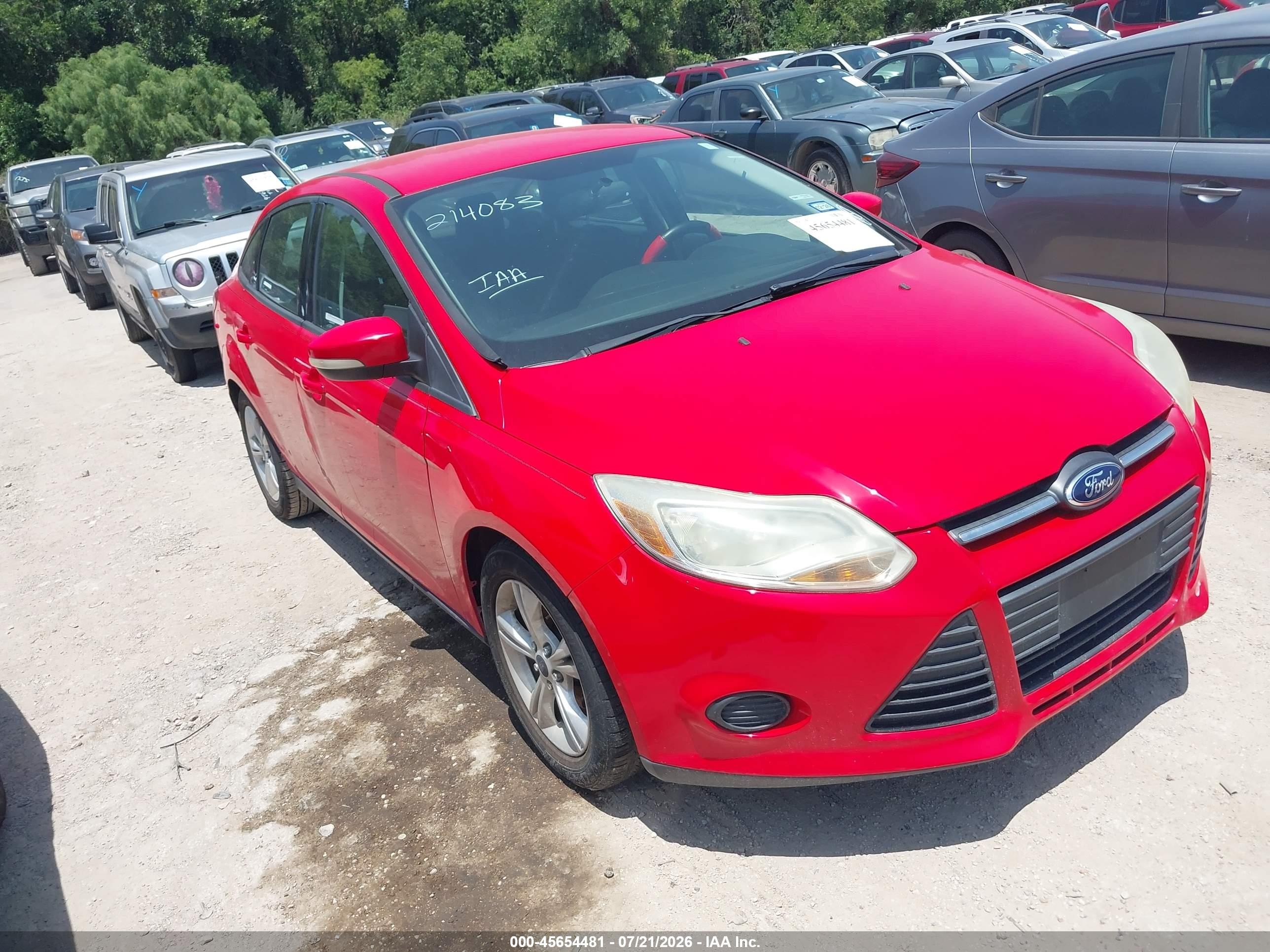 2014 Ford Focus SE, VIN 1FADP3F29EL214083 — Repossession
