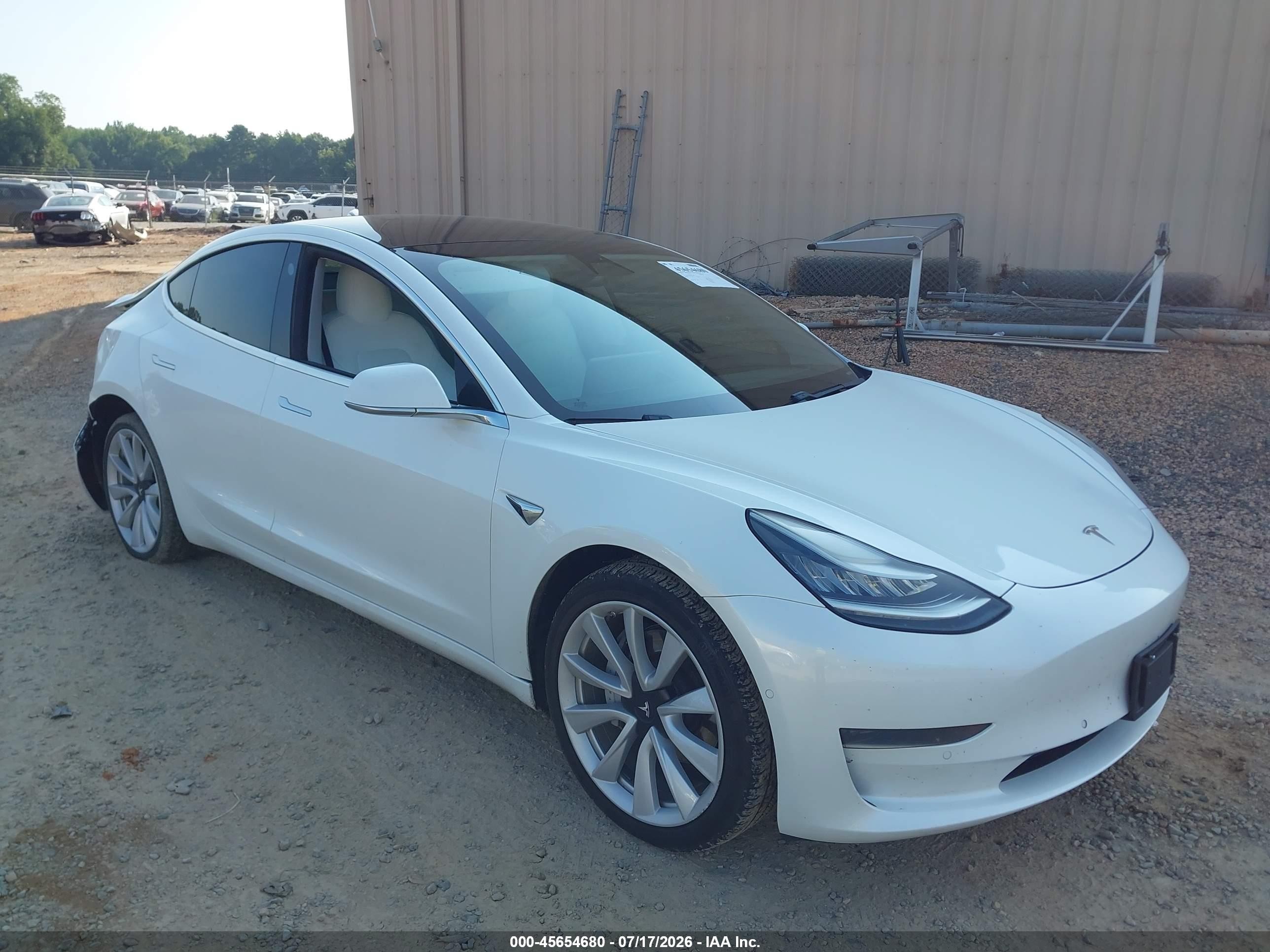 2020 Tesla Model 3 Standard Range Plus, VIN 5YJ3E1EA6LF599434 — Rear end