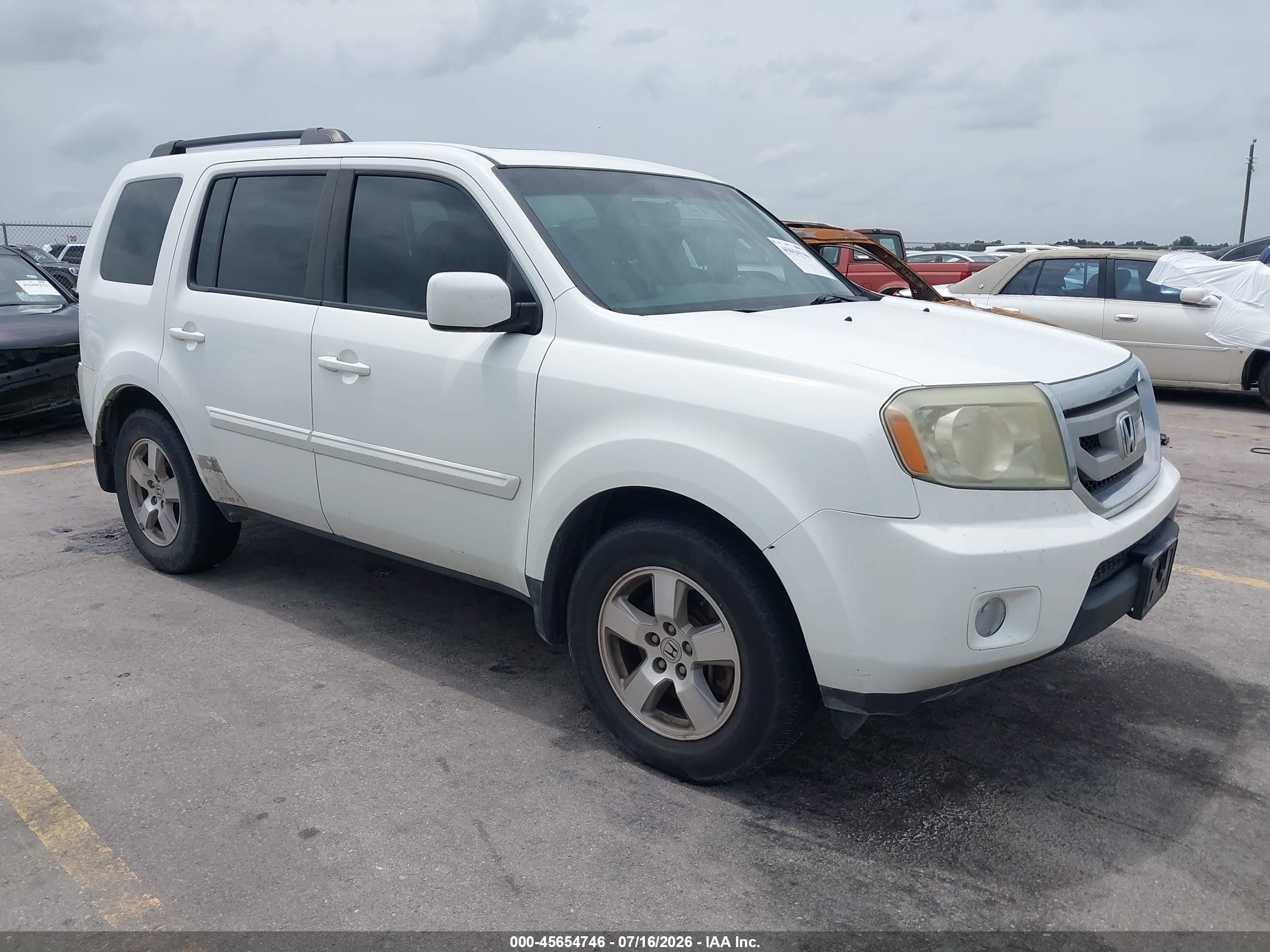 2011 Honda Pilot EX-L, VIN 5FNYF3H58BB011934 — Зад