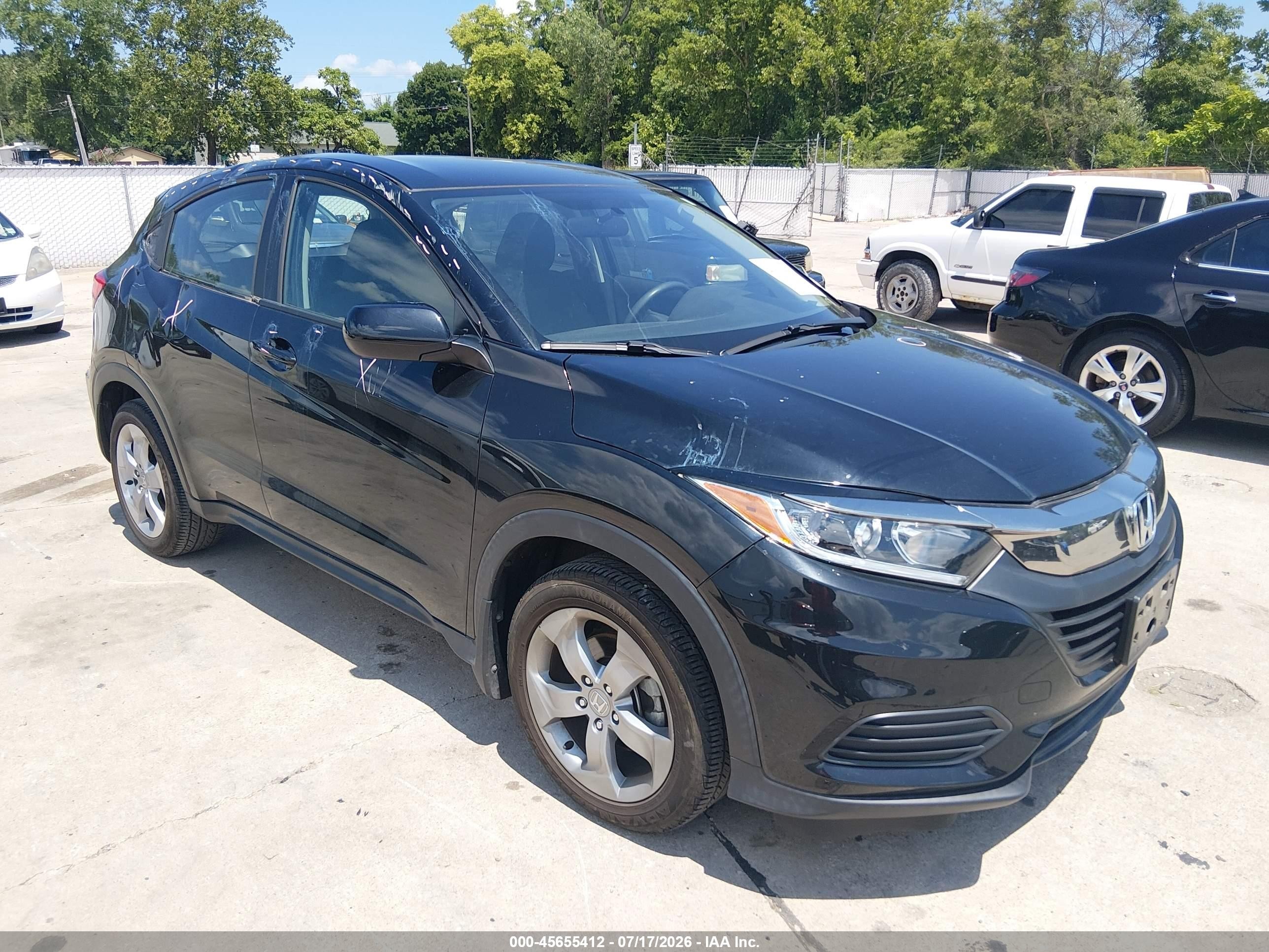2021 Honda HR-V LX, VIN 3CZRU5H30MM710861 — Бок