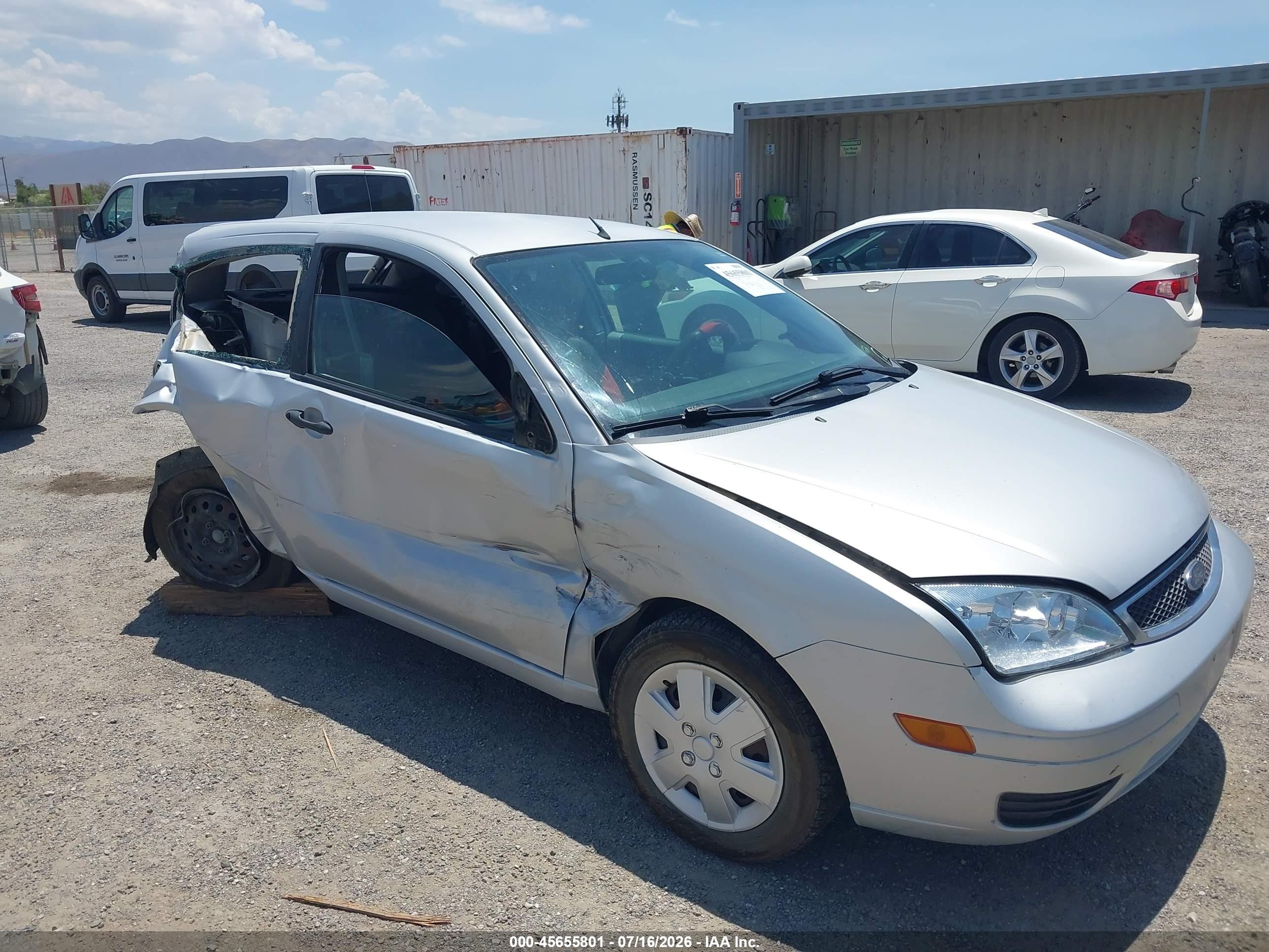 2007 Ford Focus S, VIN 1FAFP31N77W211663 — Rear end