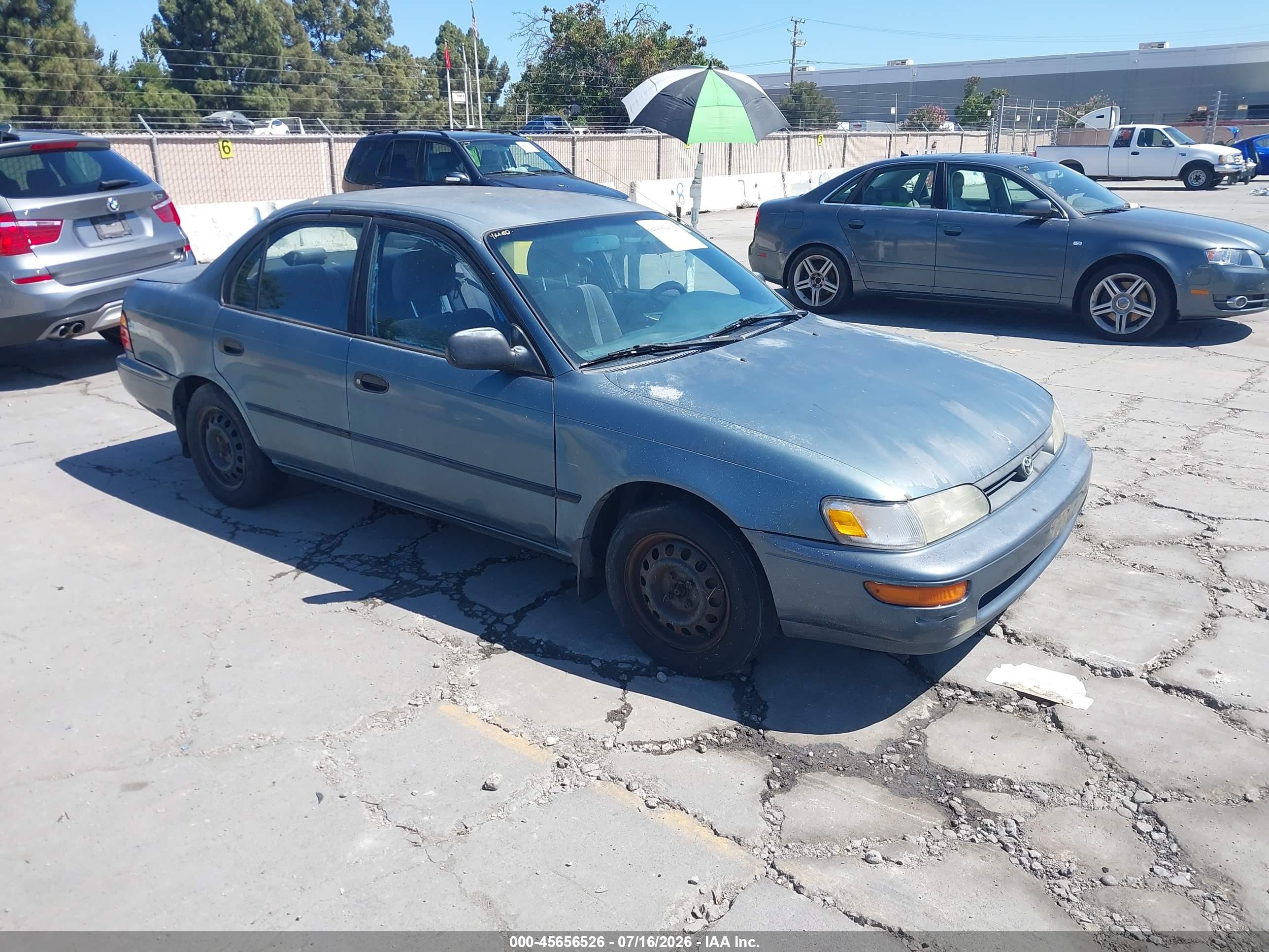 1994 Toyota Corolla Deluxe, VIN 1NXAE09B2RZ224303 — Normal wear