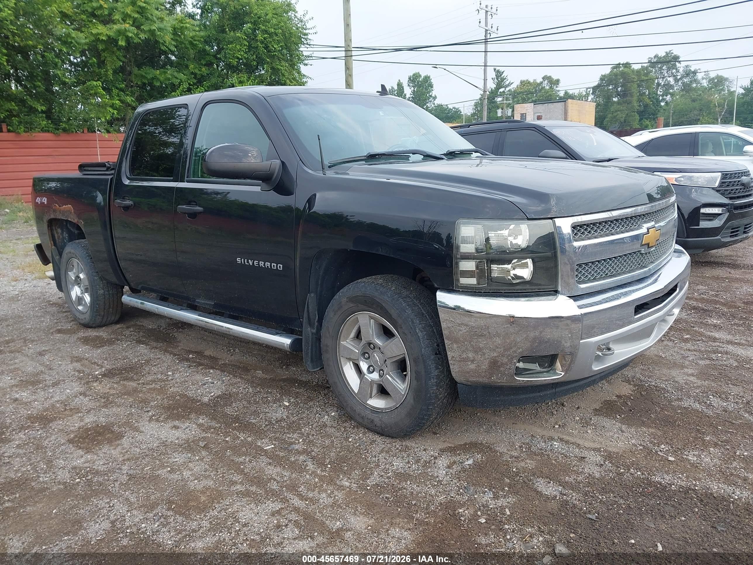 2013 Chevrolet Silverado 1500 LT, VIN 3GCPKSE77DG142423 — Rear end