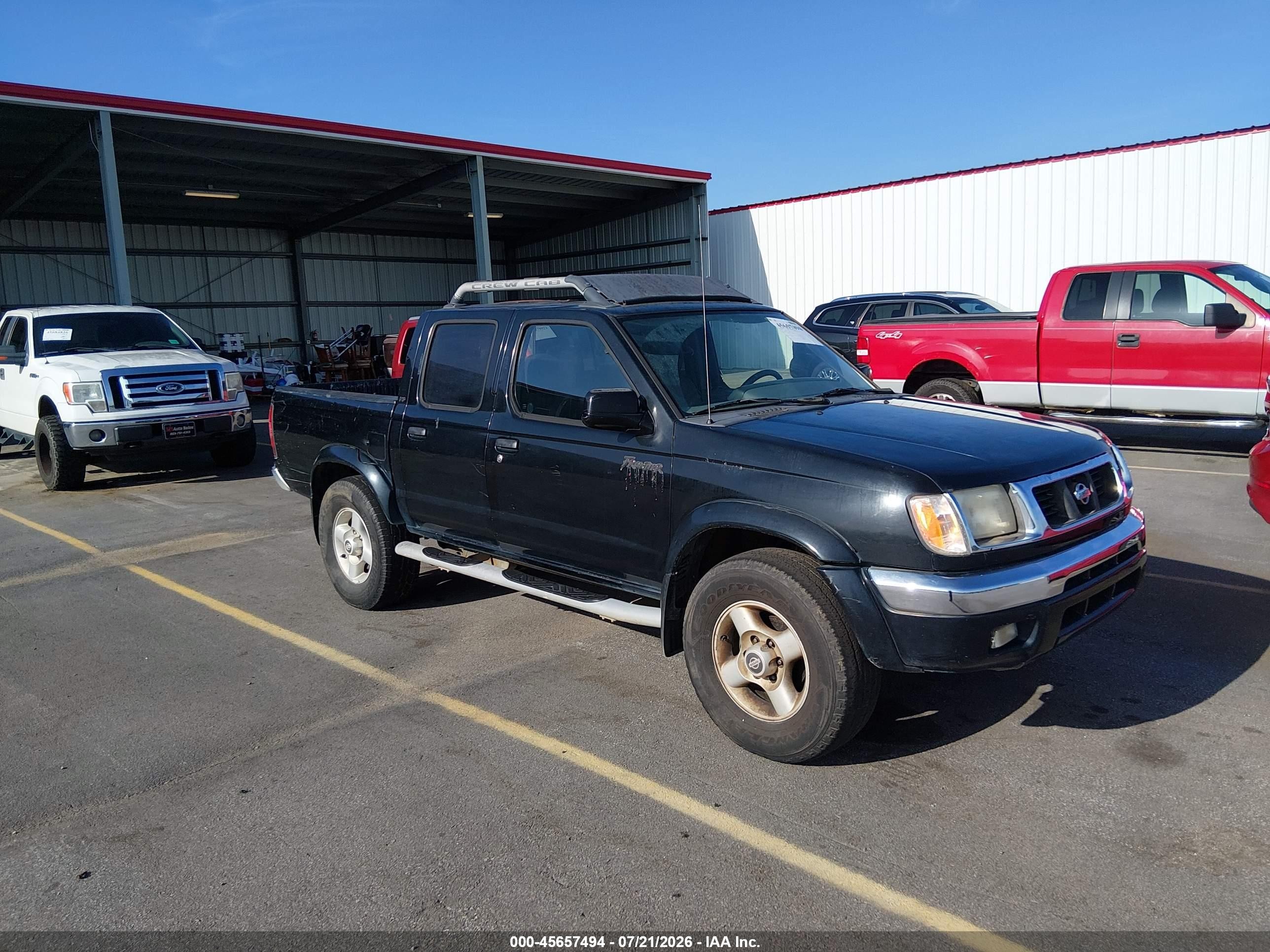 2000 Nissan Frontier XE, VIN 1N6ED27T3YC389620 — Normal wear