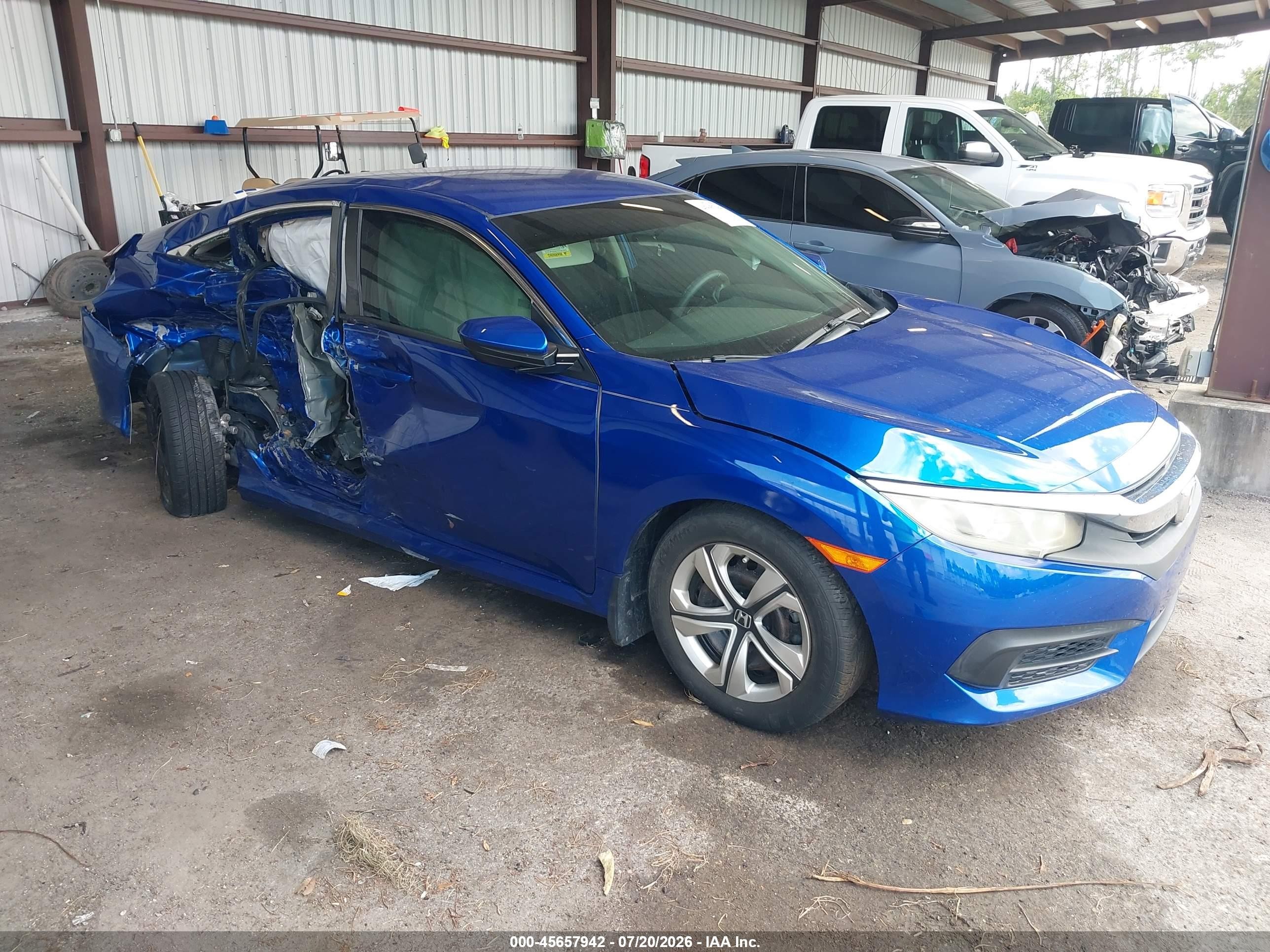 2017 Honda Civic LX, VIN 19XFC2F5XHE007492 — Side