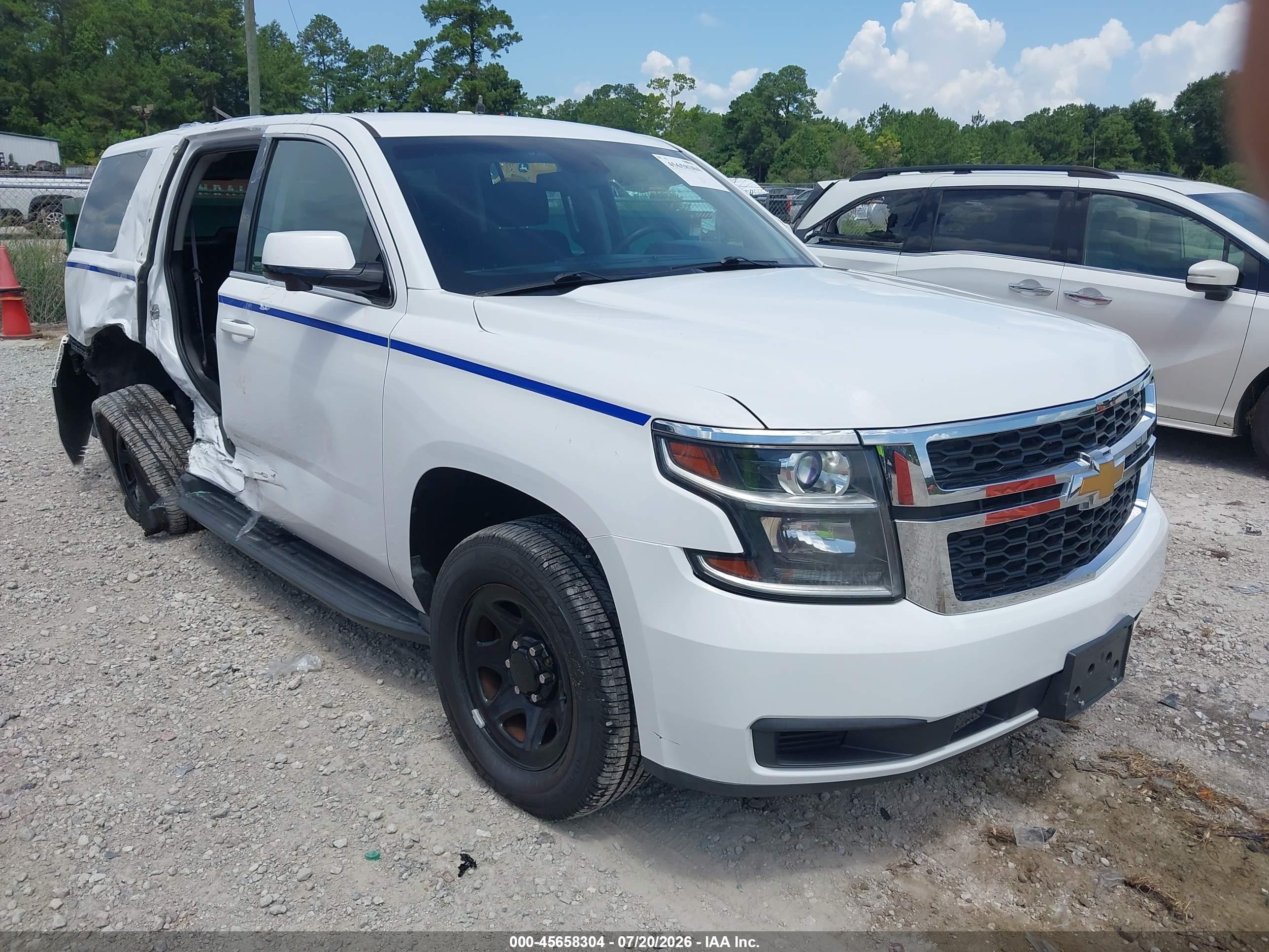 2017 Chevrolet Tahoe Commercial, VIN 1GNLCDEC3HR207186 — Бок