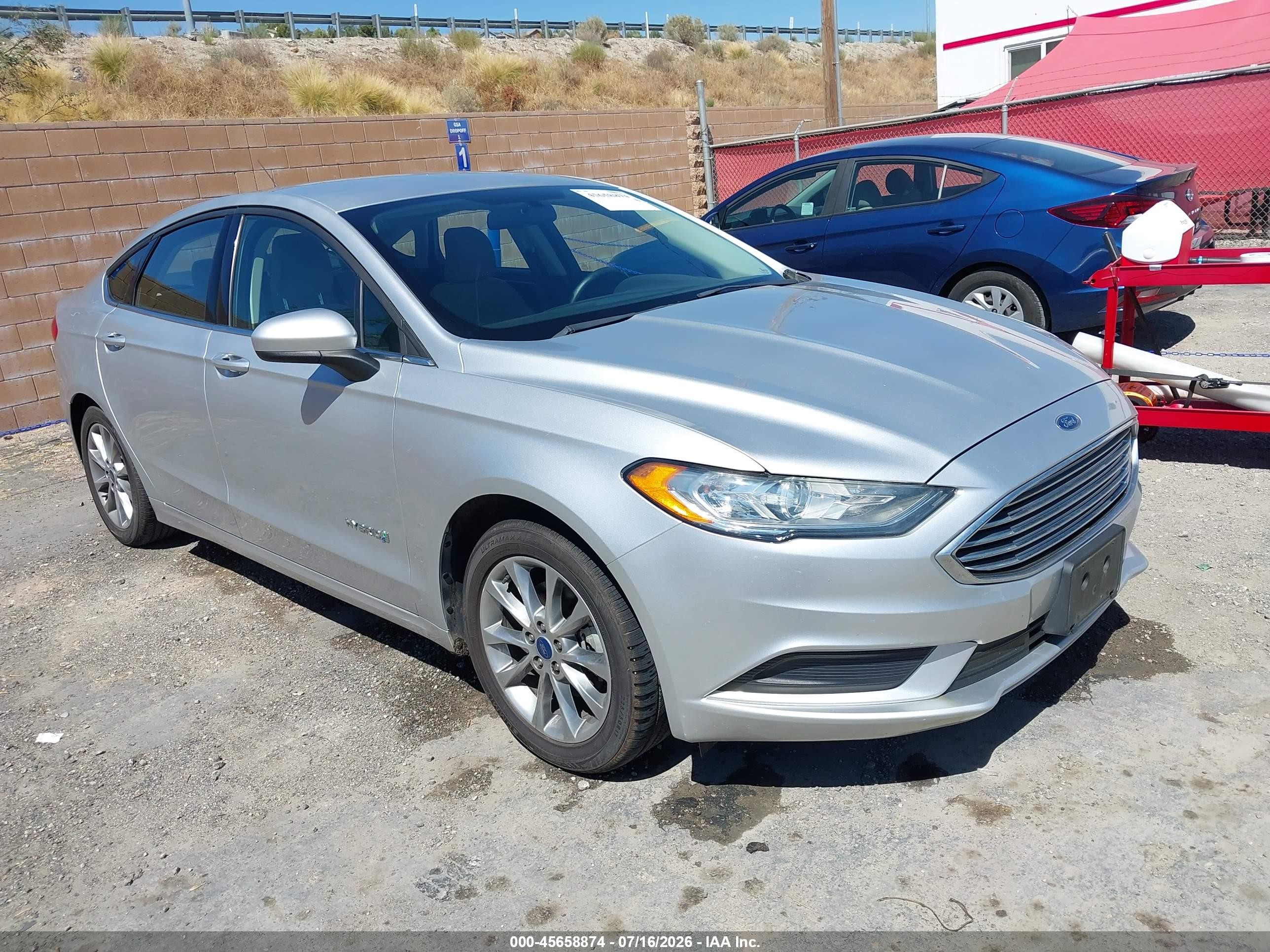 2017 Ford Fusion Hybrid S, VIN 3FA6P0UU2HR330789 — Side
