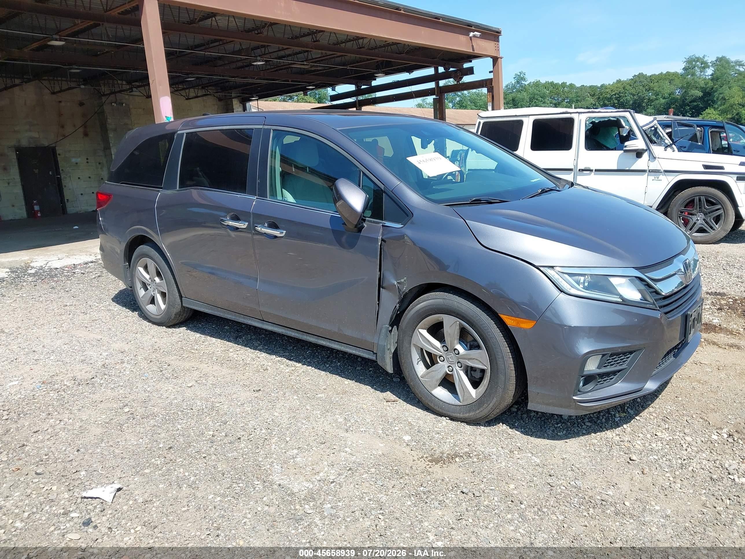 2019 Honda Odyssey EX-L, VIN 5FNRL6H7XKB132318 — Зад
