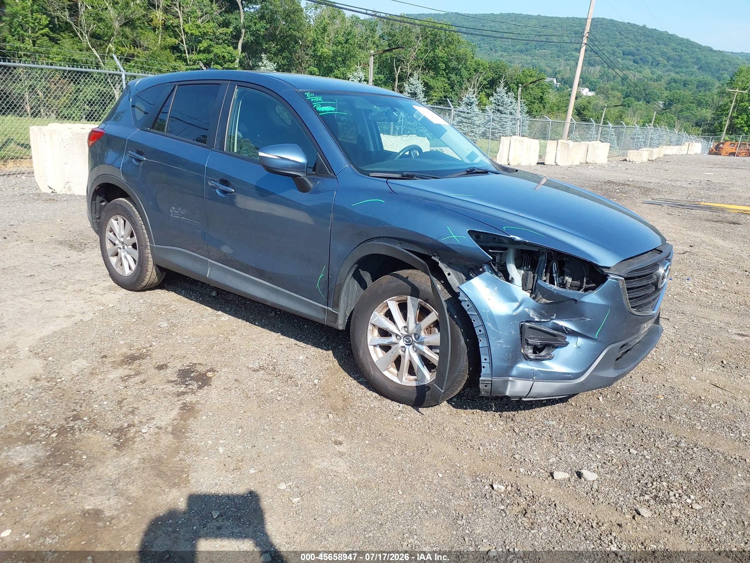 2016 Mazda CX-5 Touring, VIN JM3KE4CYXG0626255 — Front end