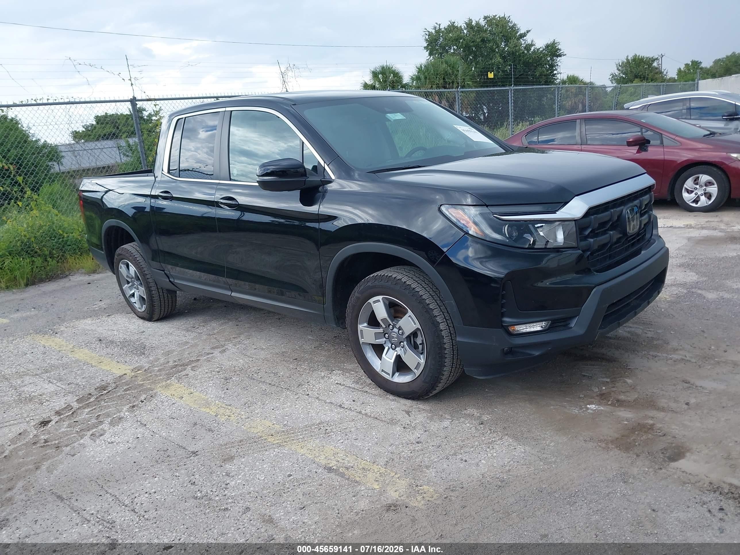 2025 Honda Ridgeline RTL, VIN 5FPYK3F50SB039913 — Side