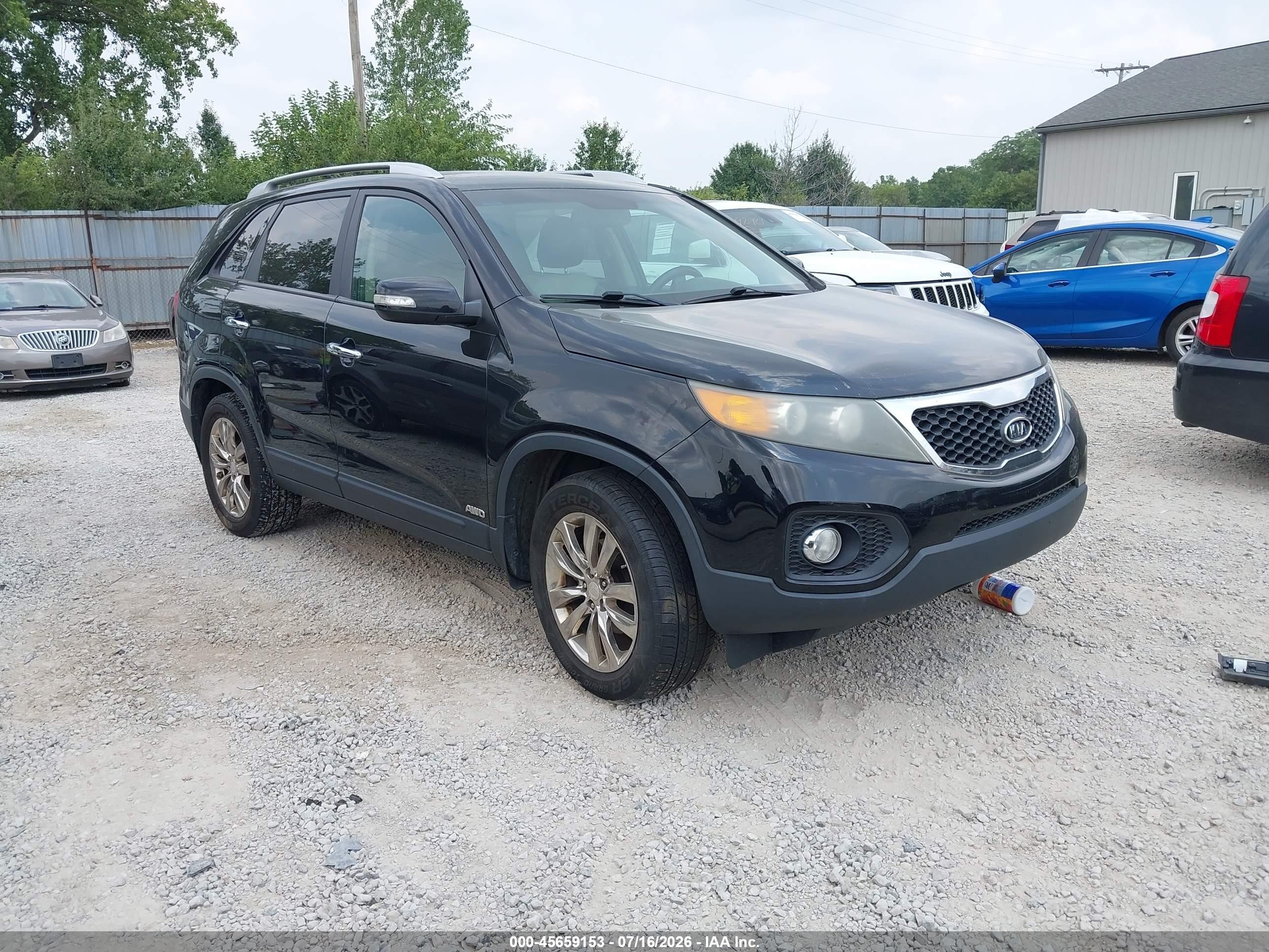 2011 Kia Sorento EX, VIN 5XYKUDA21BG038063 — Normal wear