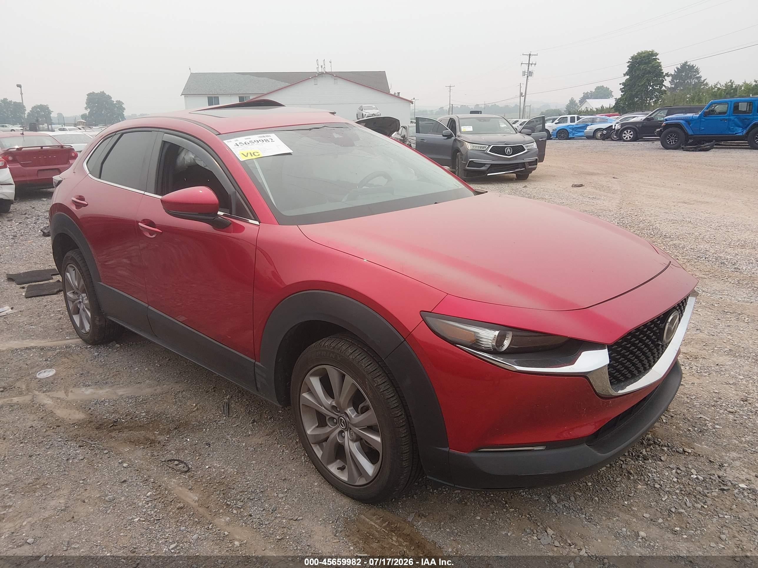 2021 Mazda CX-30 Preferred, VIN 3MVDMBCLXMM262116 — Side