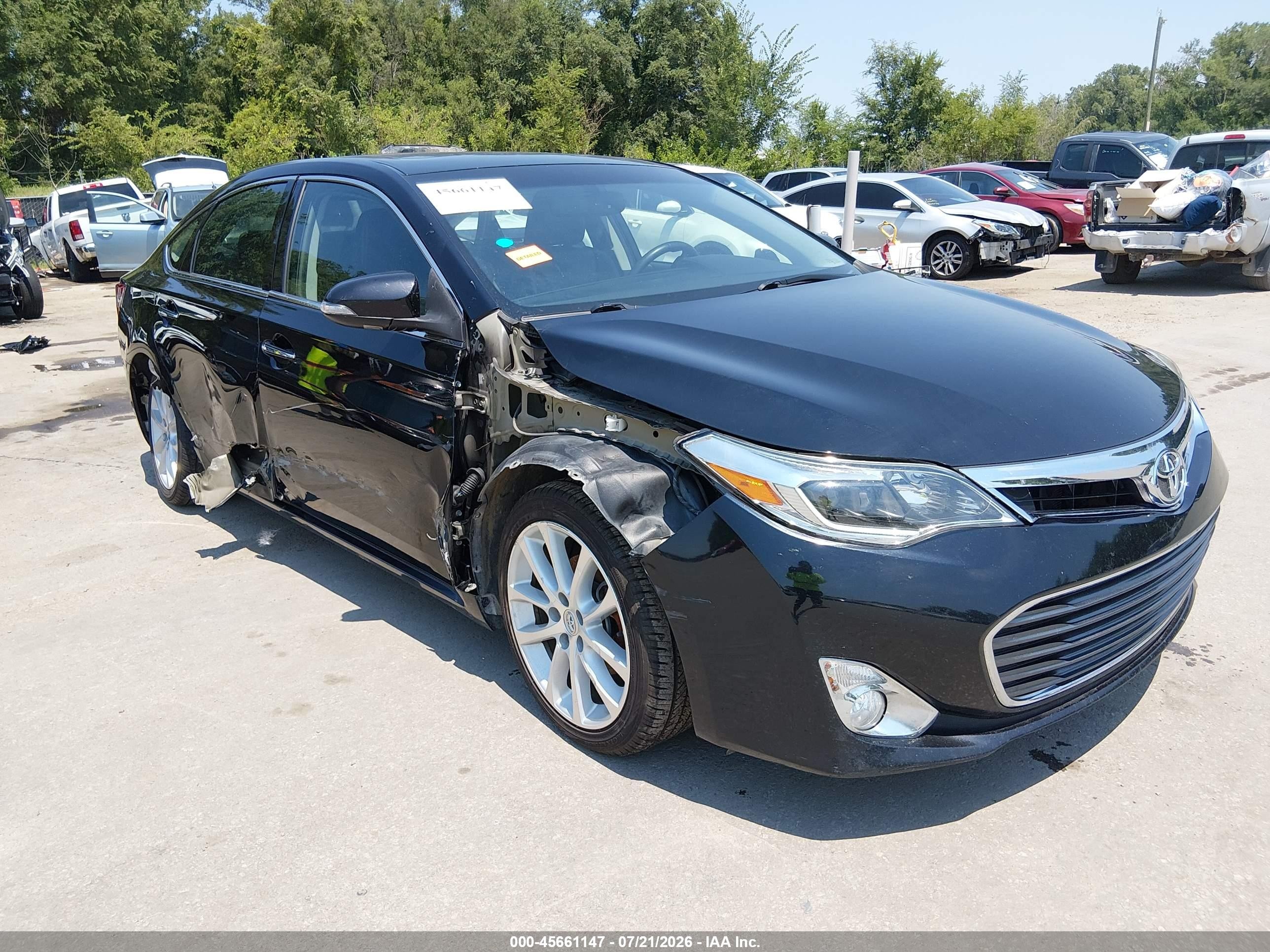 2014 Toyota Avalon XLE Touring, VIN 4T1BK1EB1EU083243 — Side