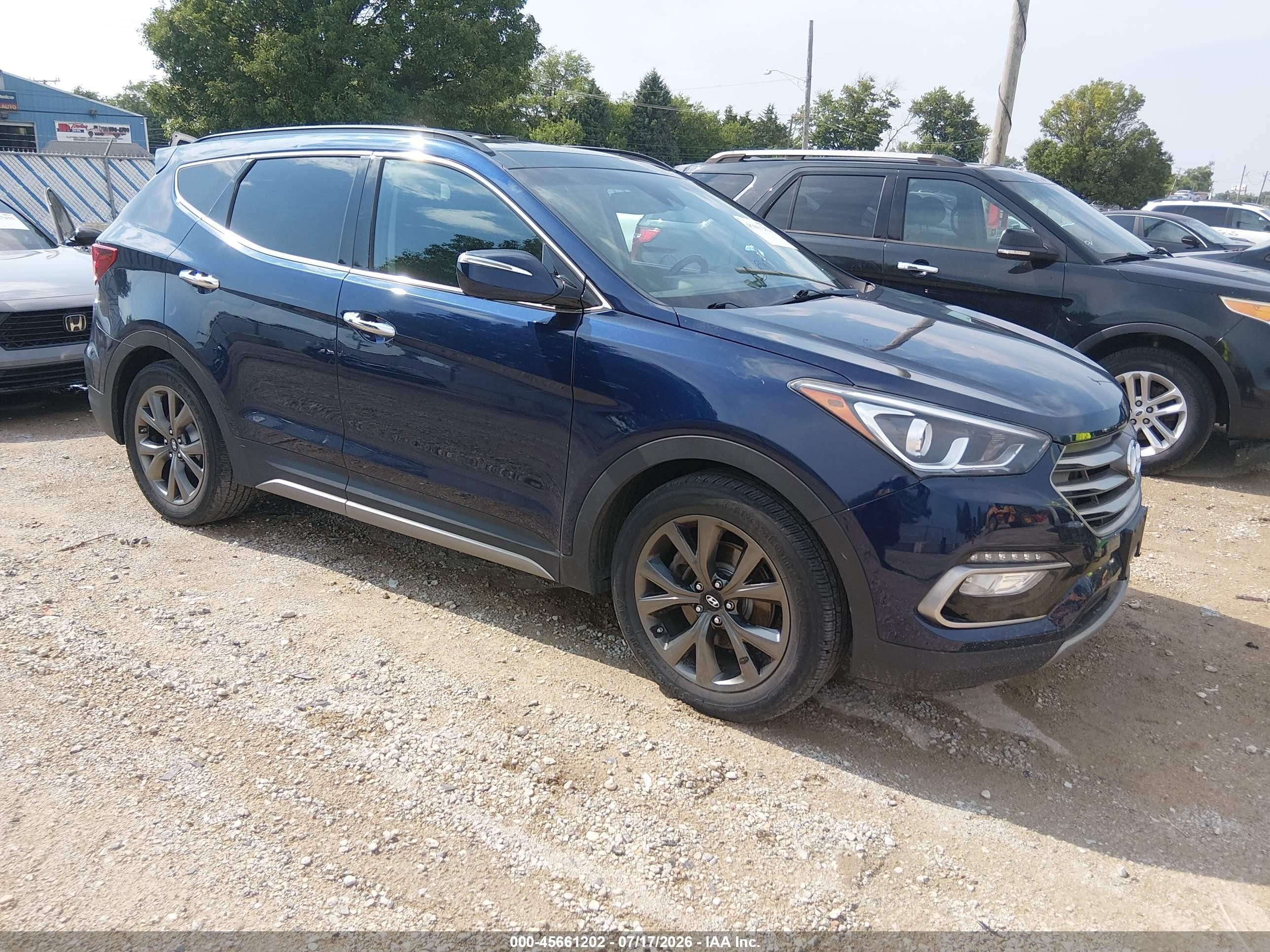 2017 Hyundai Santa Fe Ultimate, VIN 5XYZWDLA3HG425087 — Rear end