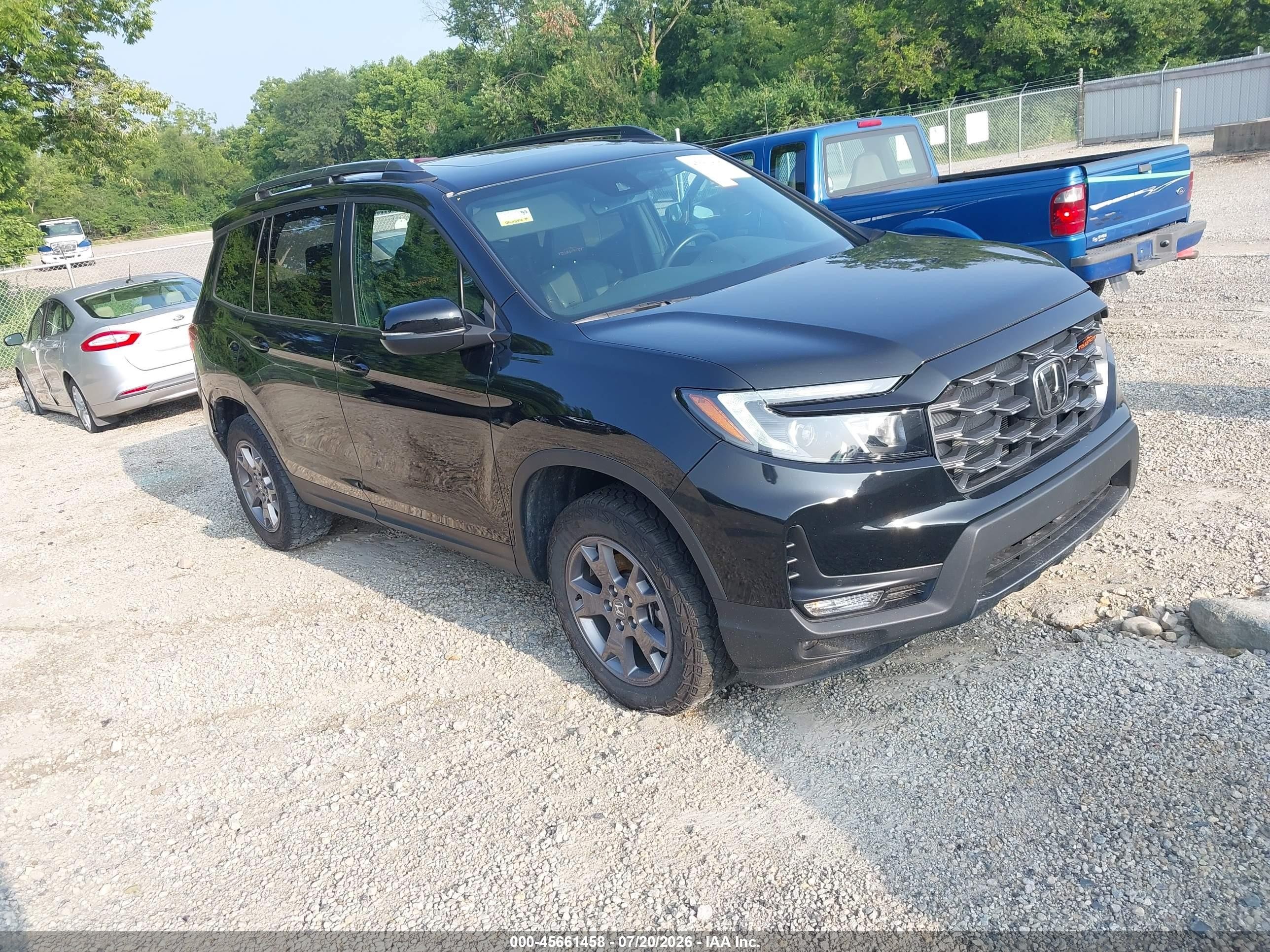 2024 Honda Passport TrailSport, VIN 5FNYF8H67RB014761 — Зад