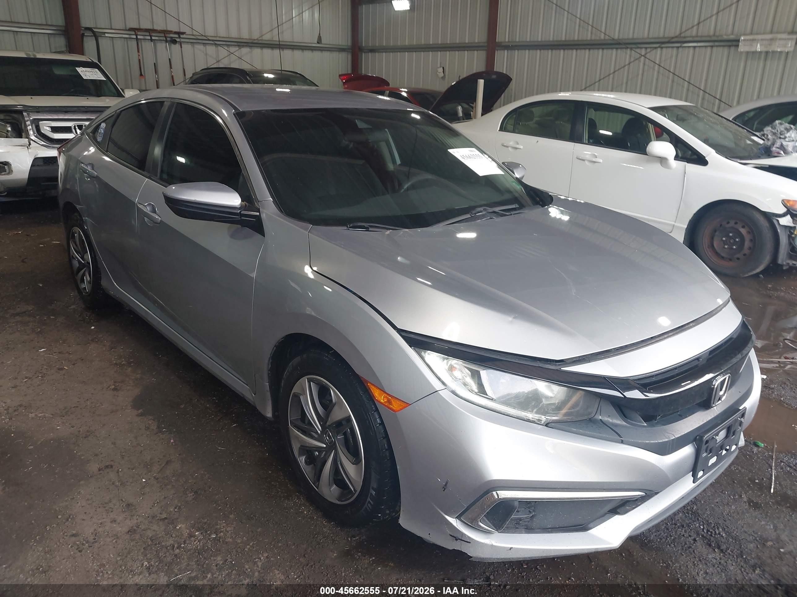 2021 Honda Civic LX, VIN 2HGFC2F68MH556133 — Side